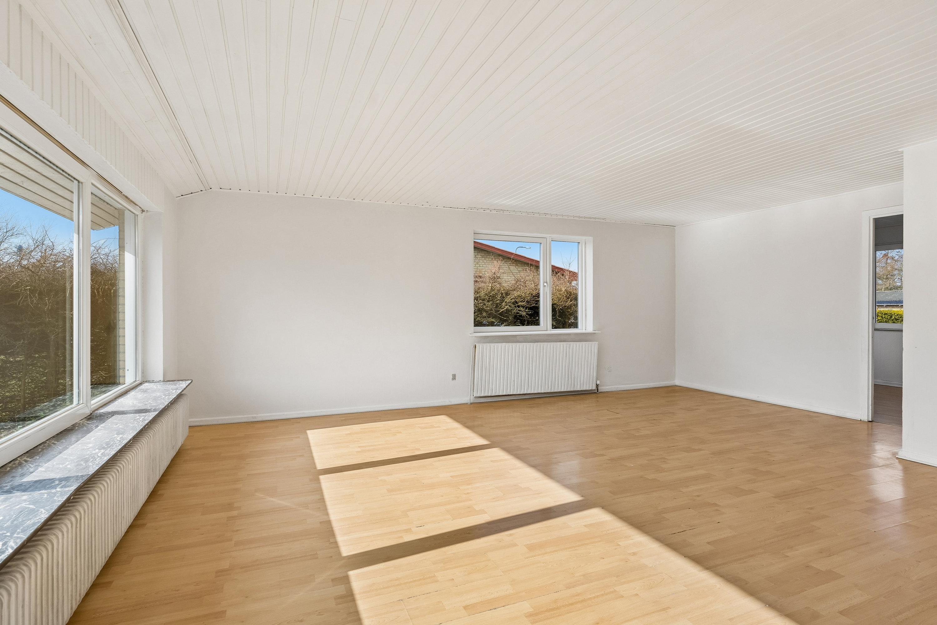 Fremhævet stue billede i fuldskærmstilstand. Billede af Toftevænget 1F, 8723 Løsning