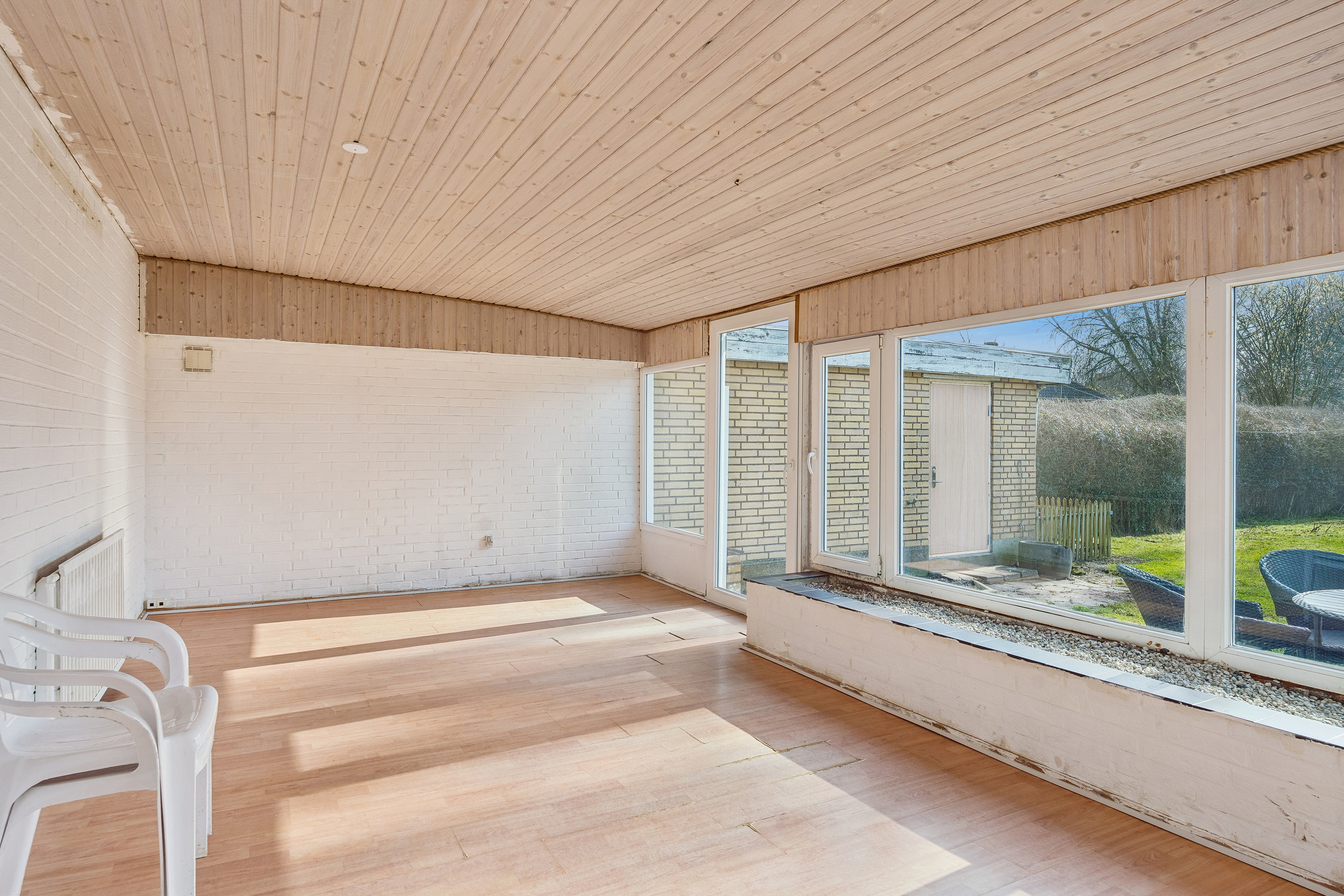 Fremhævet udestue billede i fuldskærmstilstand. Billede af Toftevænget 1F, 8723 Løsning