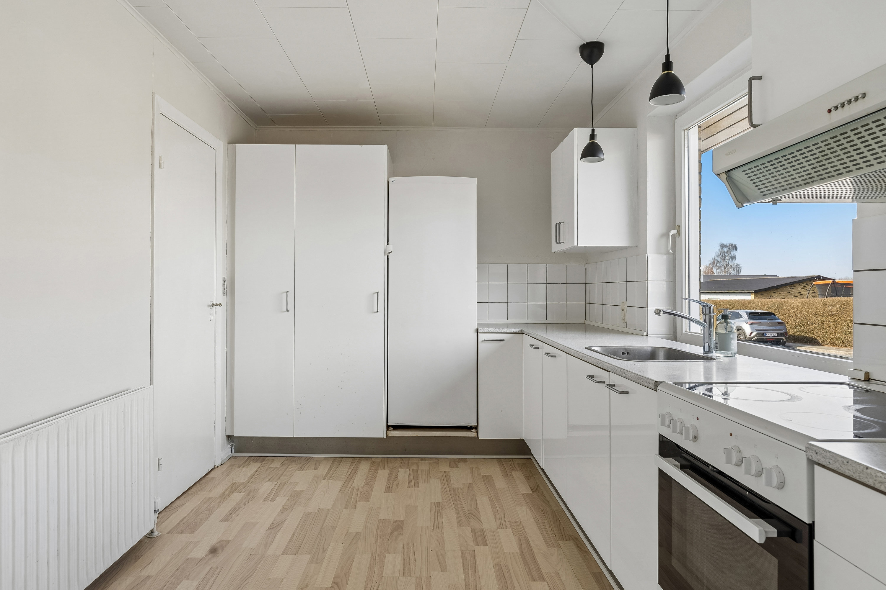 Fremhævet køkken billede i fuldskærmstilstand. Billede af Toftevænget 1F, 8723 Løsning