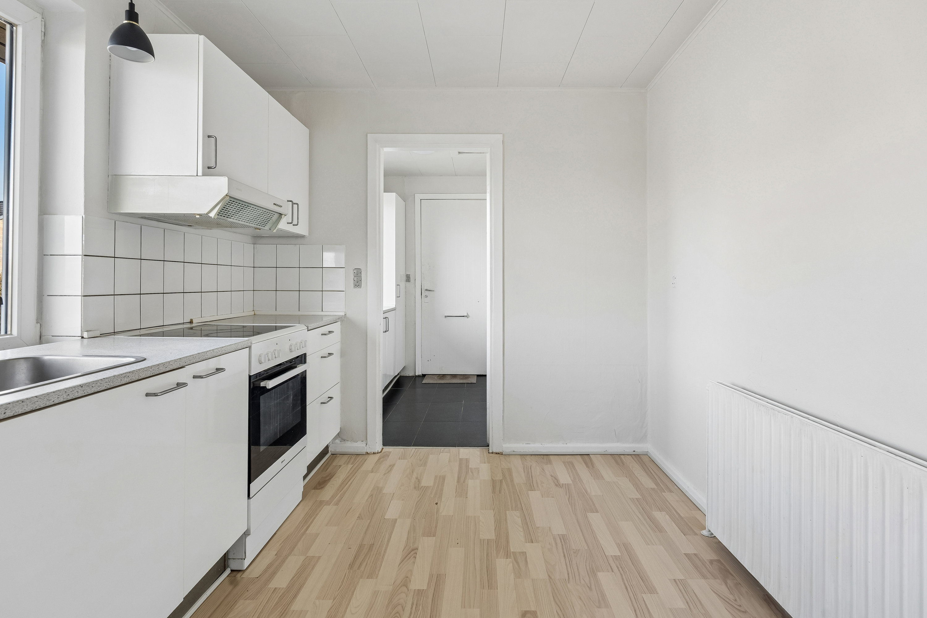 Fremhævet køkken billede i fuldskærmstilstand. Billede af Toftevænget 1F, 8723 Løsning