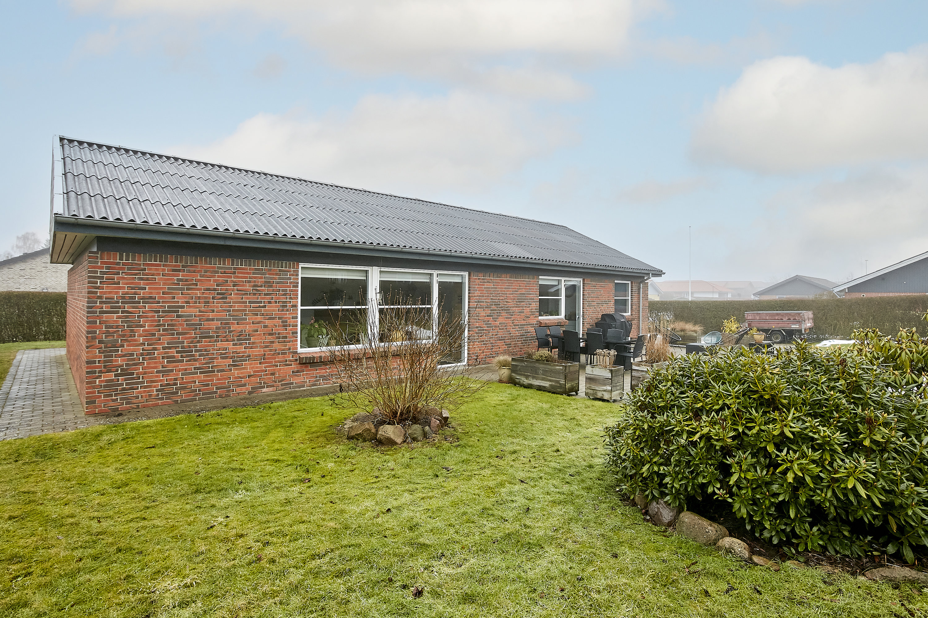 Fremhævet facade fra haven billede i fuldskærmstilstand. Billede af Krokusvej 77, Tyrsted, 8700 Horsens