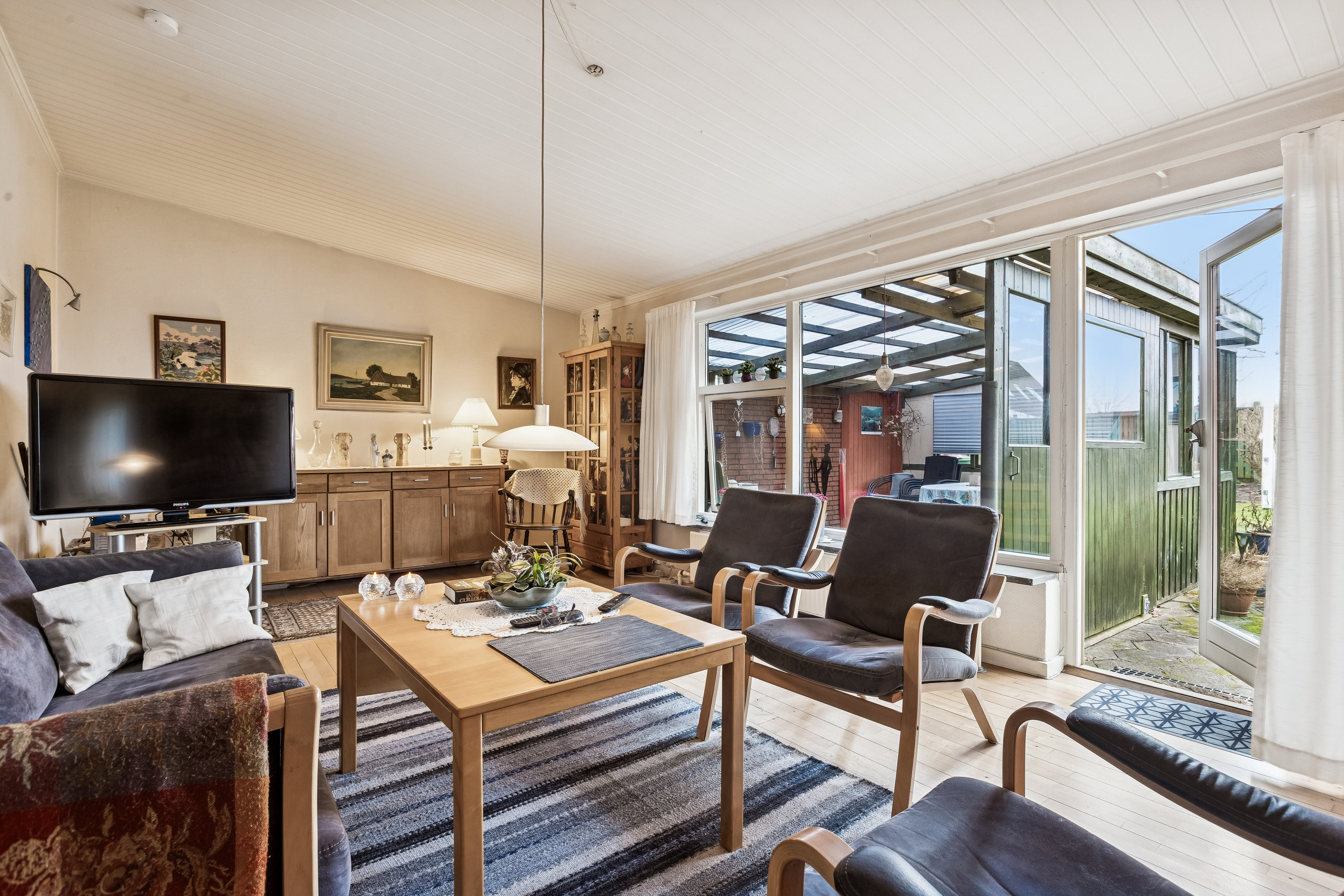 Fremhævet stue billede i fuldskærmstilstand. Billede af Blåhøjvej 8, 2770 Kastrup