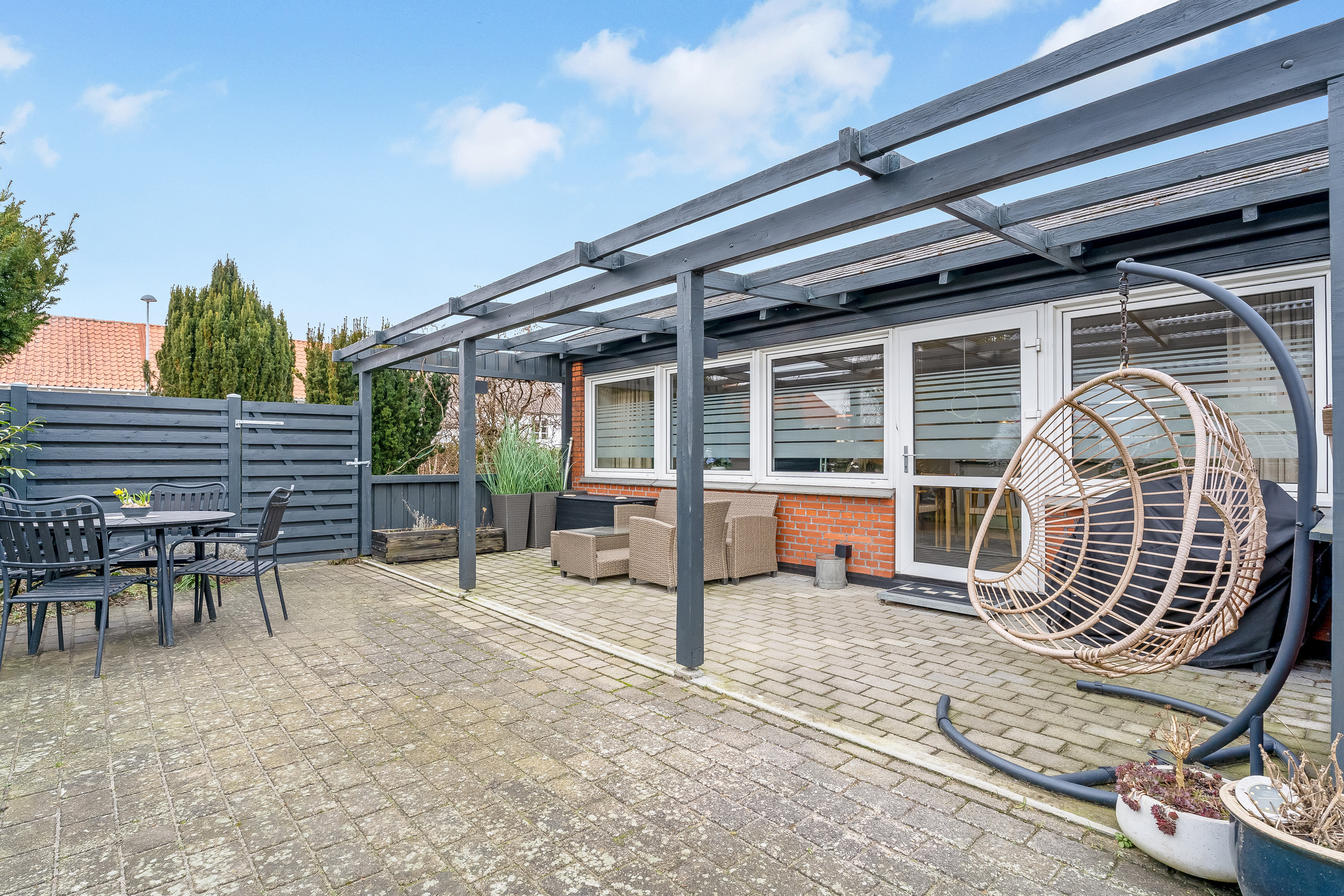 Fremhævet overdækket terrasse billede i fuldskærmstilstand. Billede af Nørrevænget 12, 4800 Nykøbing F