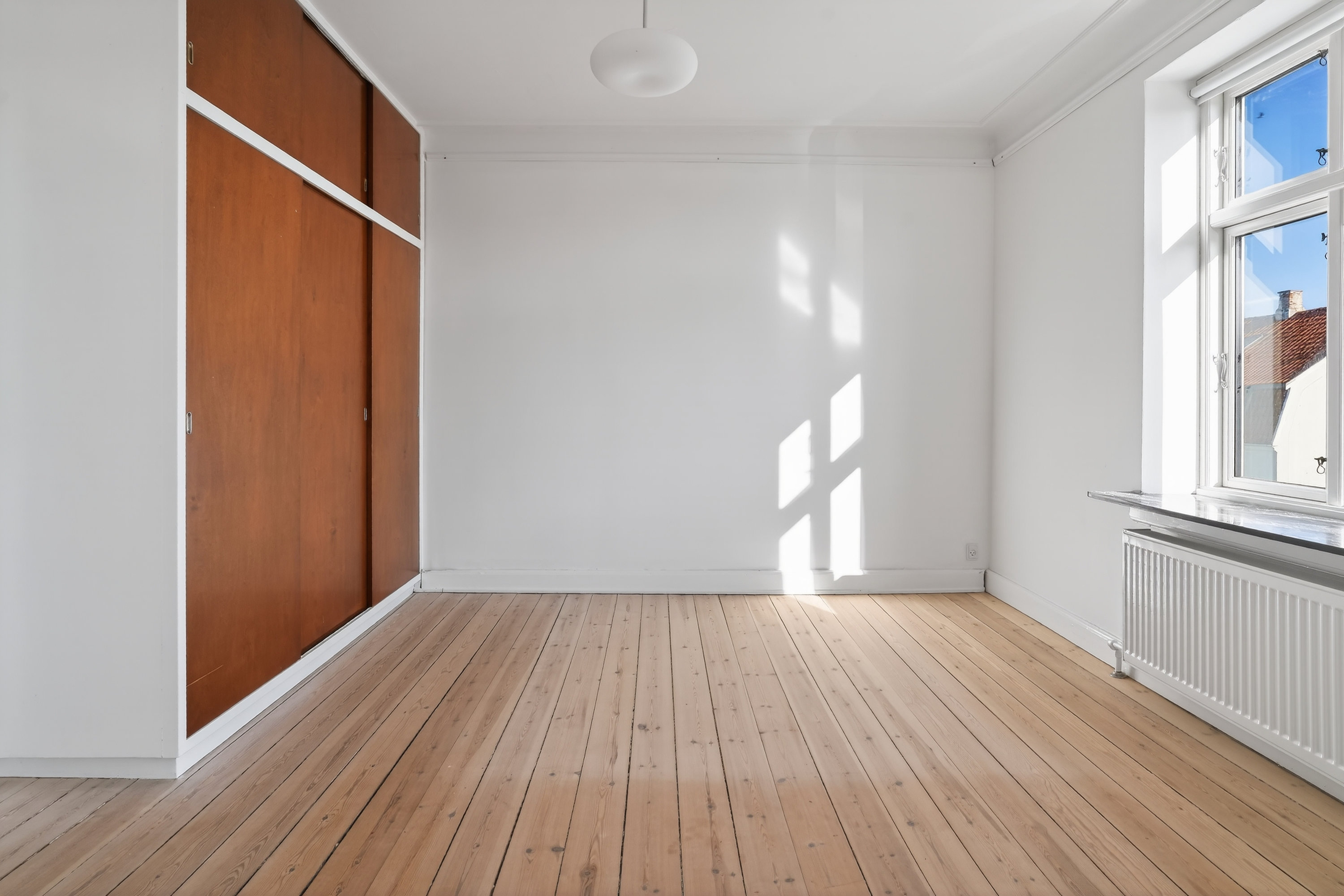 Fremhævet stue billede i fuldskærmstilstand. Billede af Rosenvænget 5, 3000 Helsingør