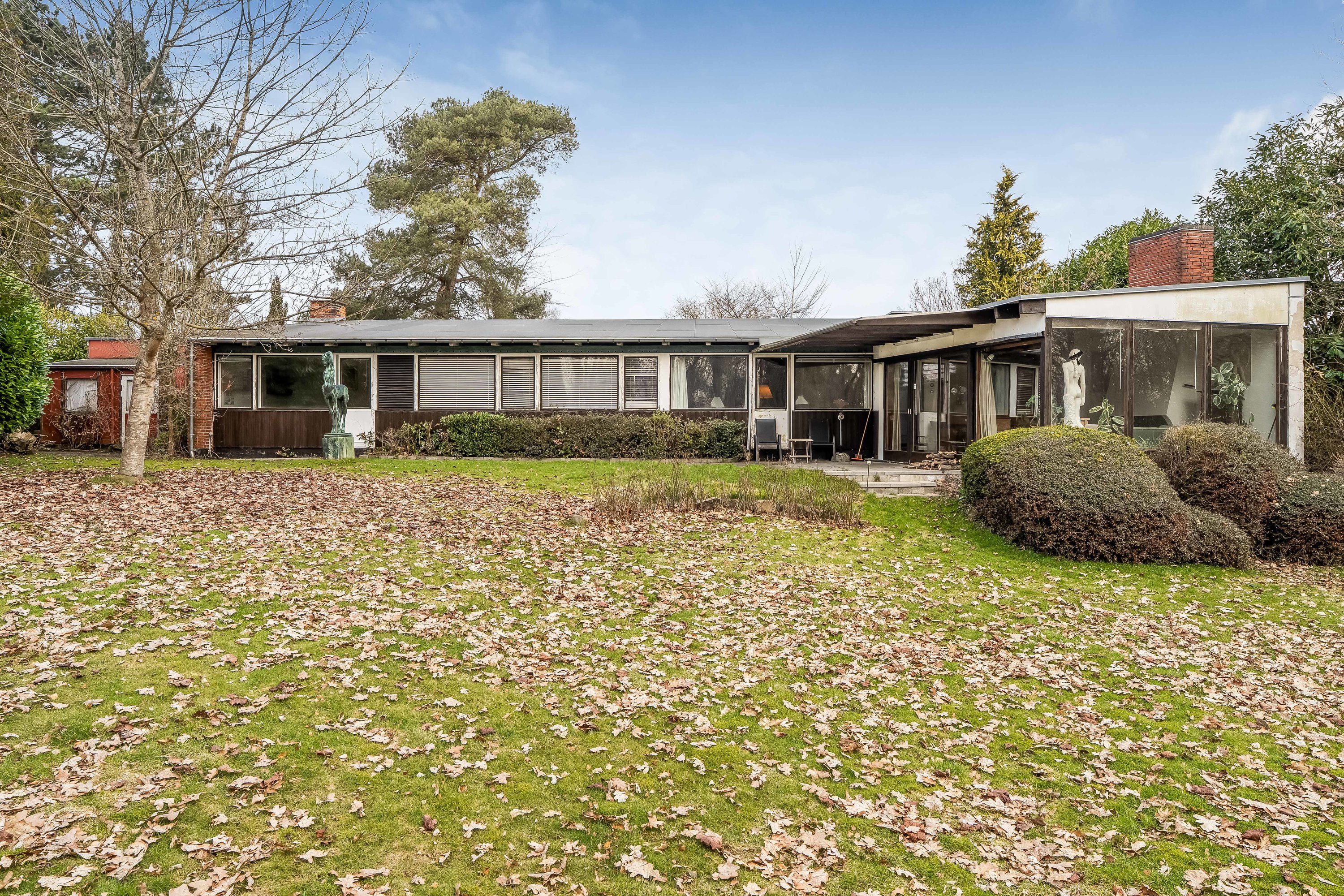 Fremhævet facade billede i fuldskærmstilstand. Billede af Skovtoftebakken 11, 2830 Virum