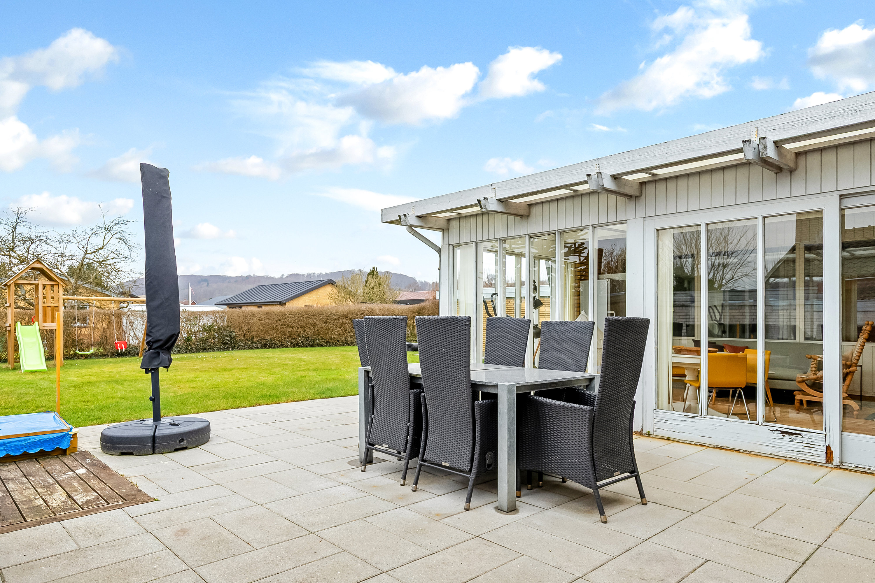 Fremhævet terrasse billede i fuldskærmstilstand. Billede af Musvitvej 27, 7100 Vejle