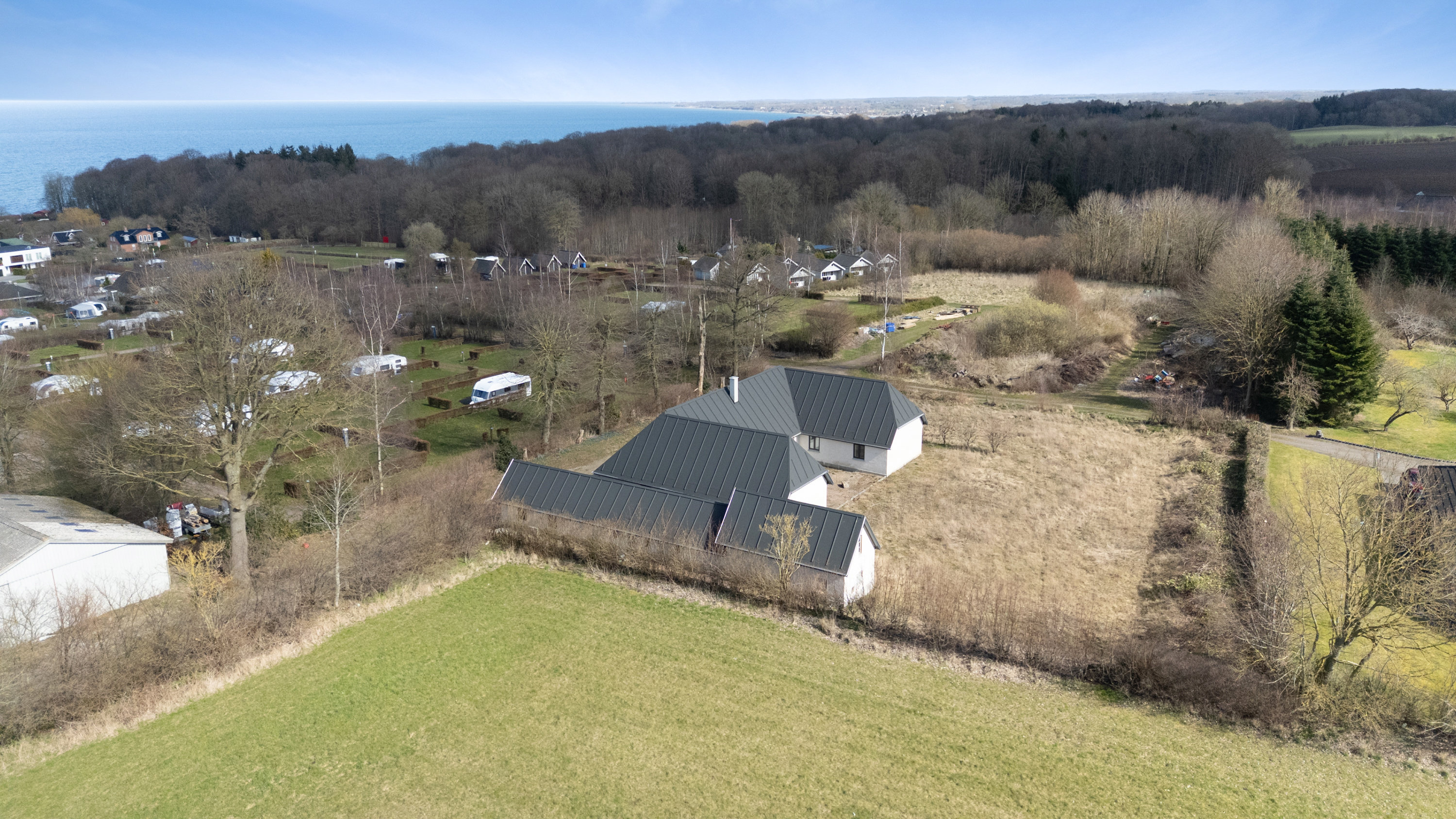 Fremhævet luftfoto billede i fuldskærmstilstand. Billede af Kystvejen 1A, Baaring Mark, 5466 Asperup