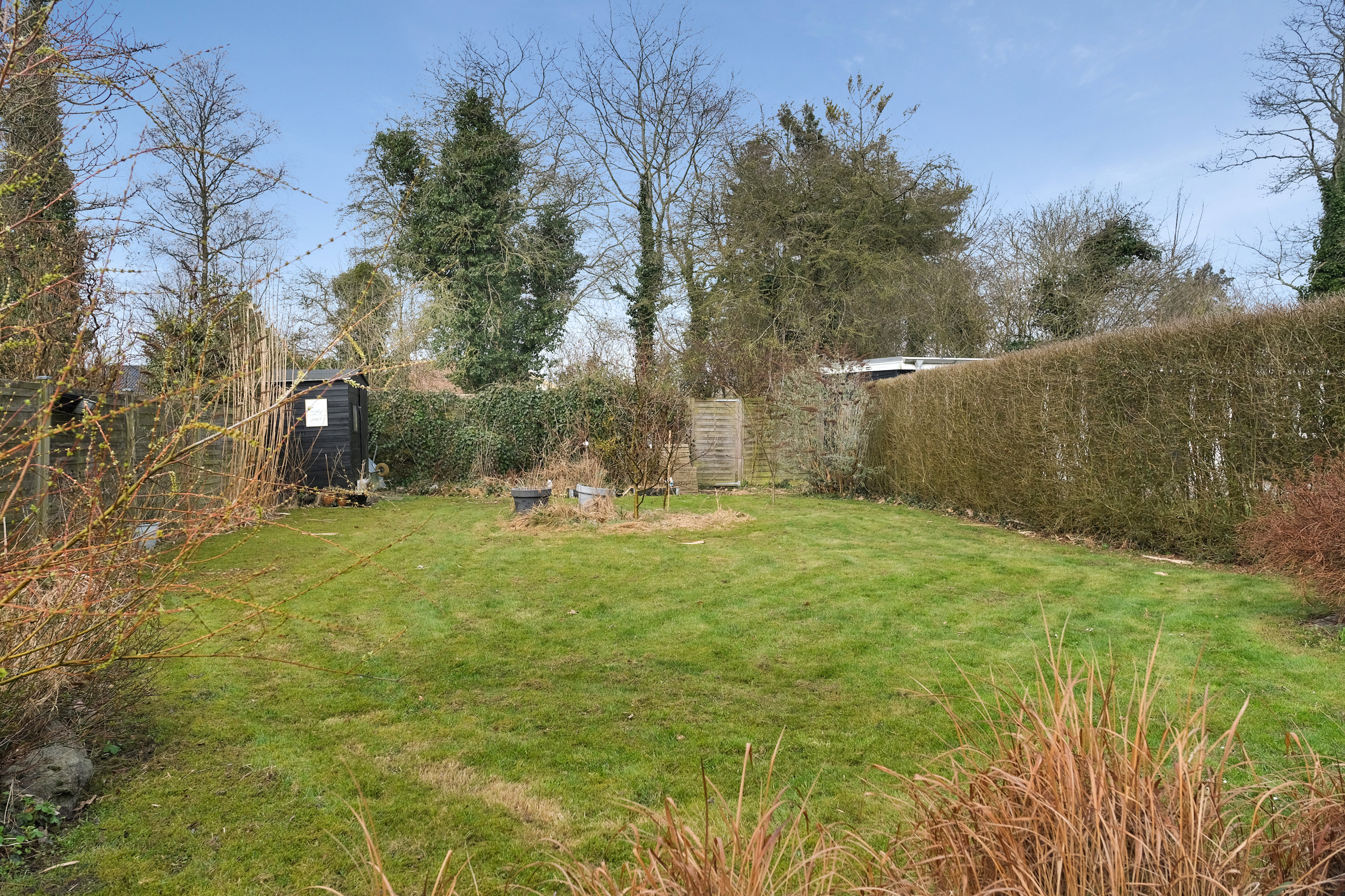 Fremhævet baghave billede i fuldskærmstilstand. Billede af Arreskovvænget 18, 5230 Odense M