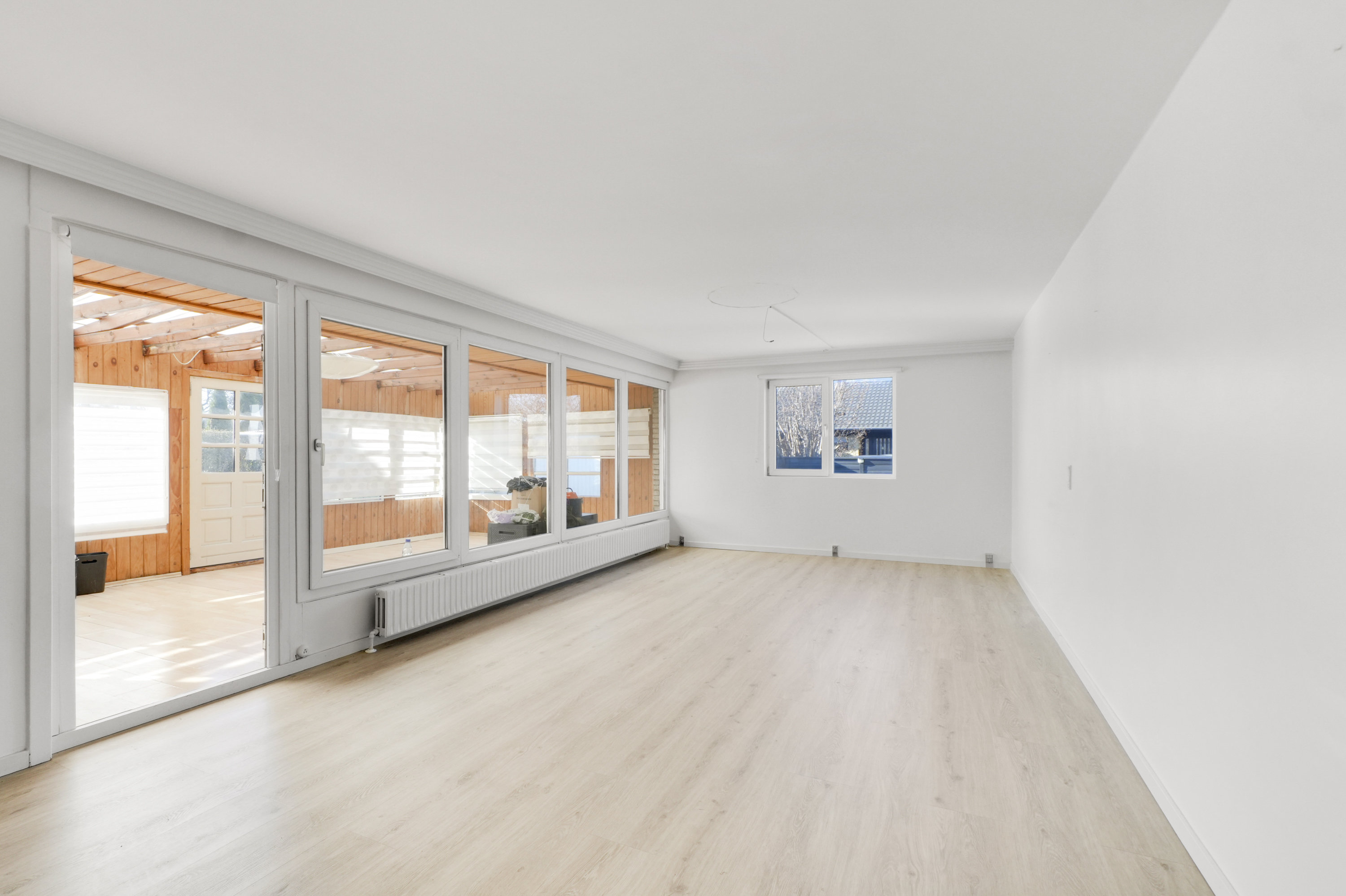 Fremhævet stue billede i fuldskærmstilstand. Billede af Landlyst Vænge 19, 2635 Ishøj