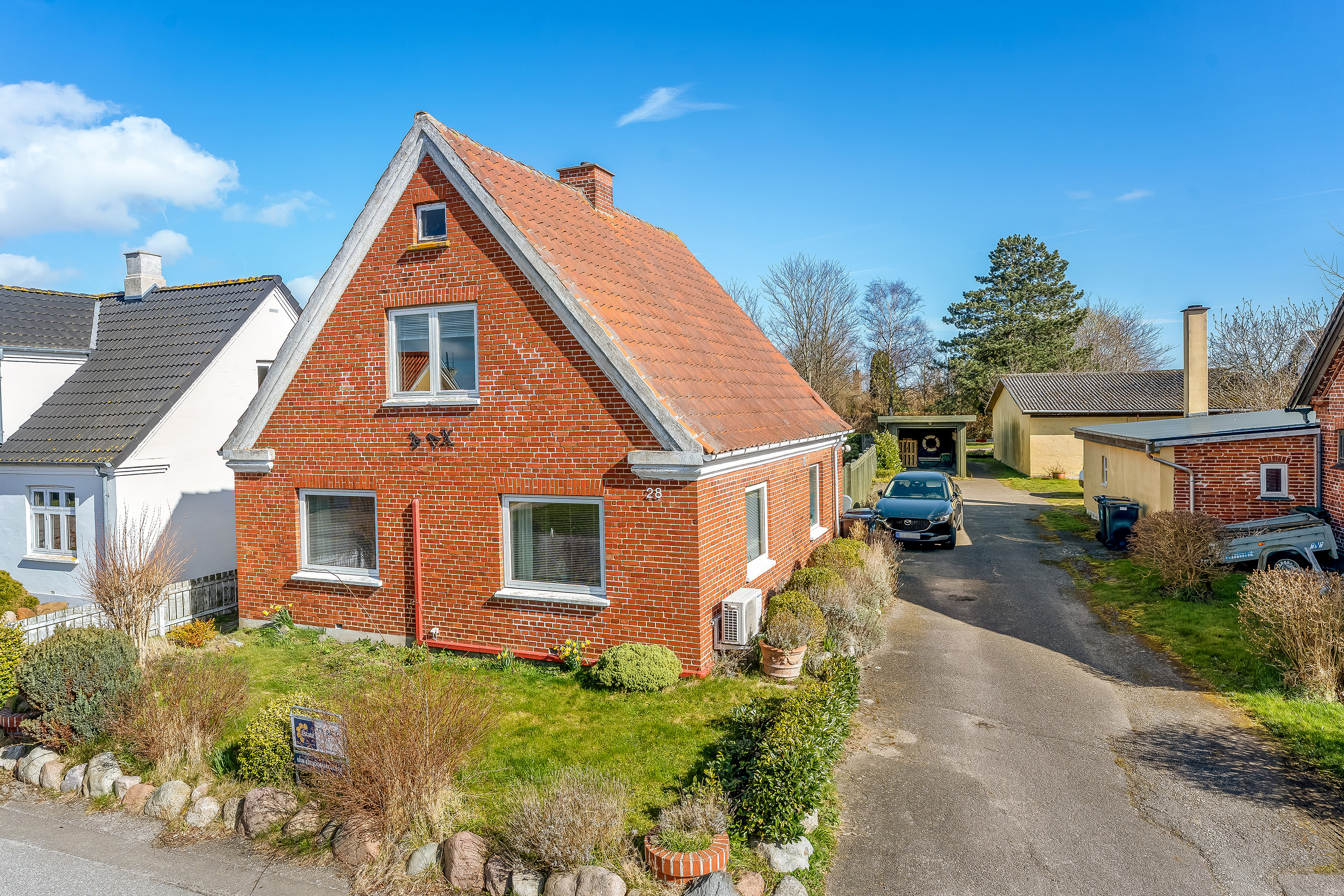 Fremhævet facade billede i fuldskærmstilstand. Billede af Havnevej 28, Langø, 4900 Nakskov