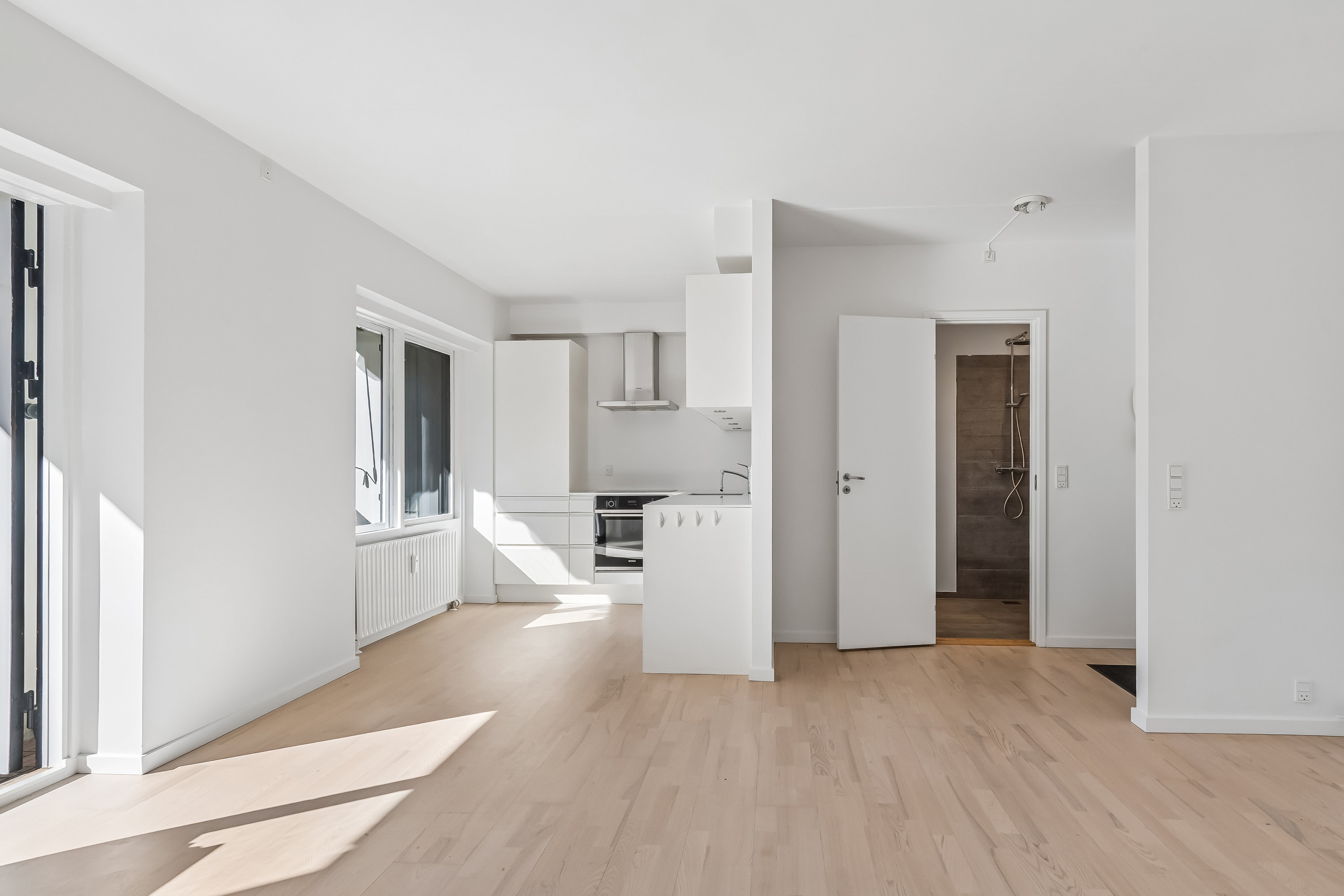 Fremhævet stue billede i fuldskærmstilstand. Billede af Bredebovej 27, st.. mf., 2800 Kongens Lyngby