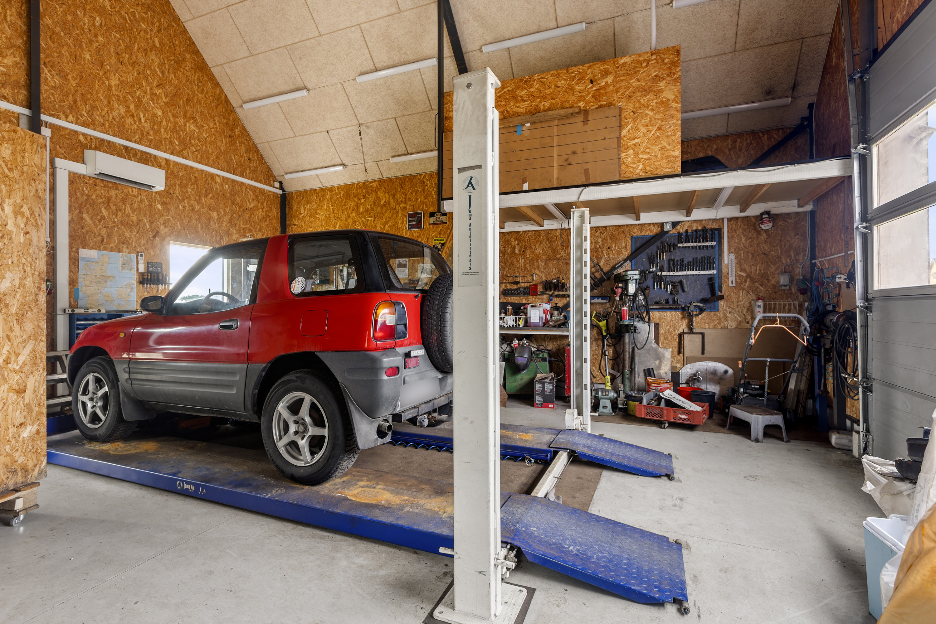 Fremhævet garage billede i fuldskærmstilstand. Billede af Onsved Huse 1, 4050 Skibby