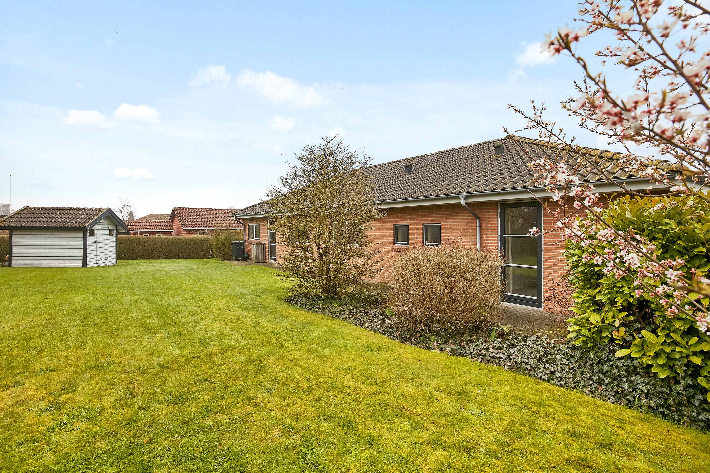 Fremhævet set fra haven billede i fuldskærmstilstand. Billede af Tonrå 46, 8751 Gedved