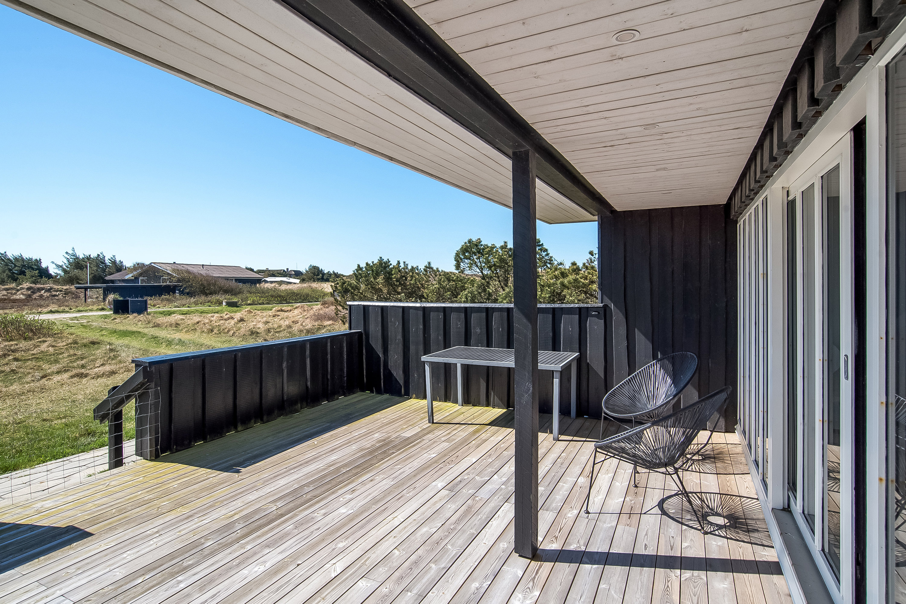 Fremhævet terrasse billede i fuldskærmstilstand. Billede af Wolle Friks Vej 26, Søndervig, 6950 Ringkøbing