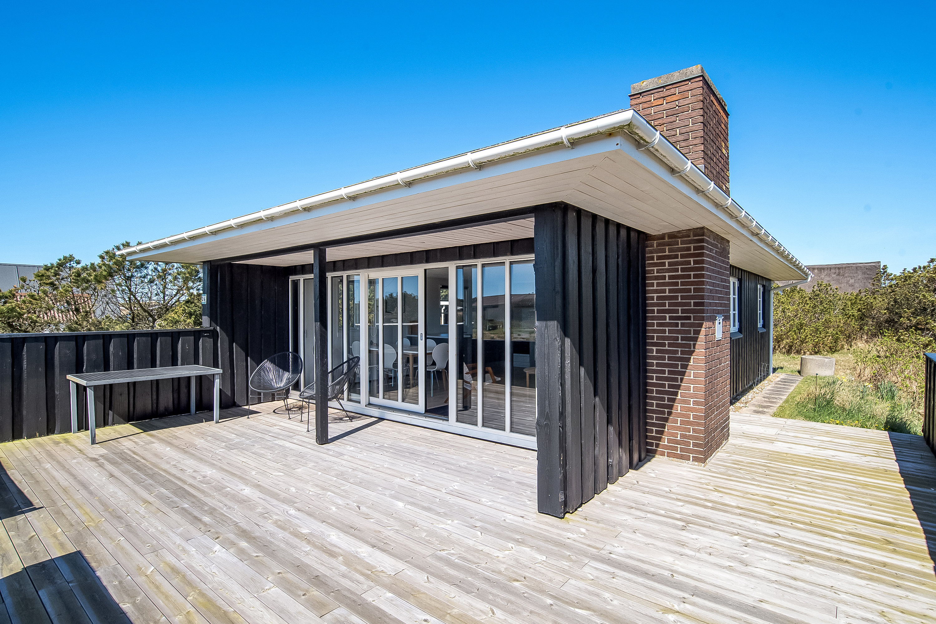 Fremhævet terrasse billede i fuldskærmstilstand. Billede af Wolle Friks Vej 26, Søndervig, 6950 Ringkøbing