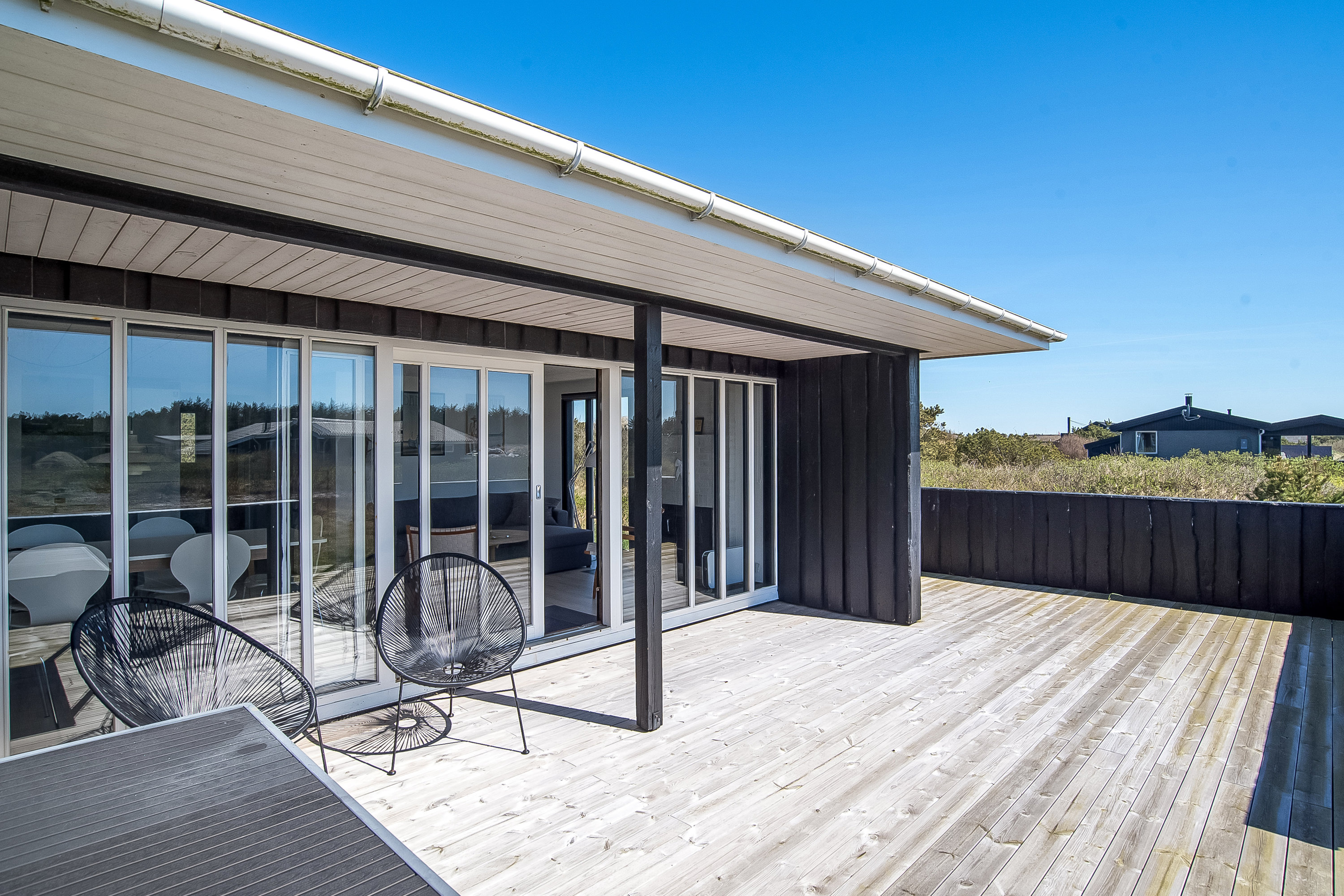 Fremhævet terrasse billede i fuldskærmstilstand. Billede af Wolle Friks Vej 26, Søndervig, 6950 Ringkøbing