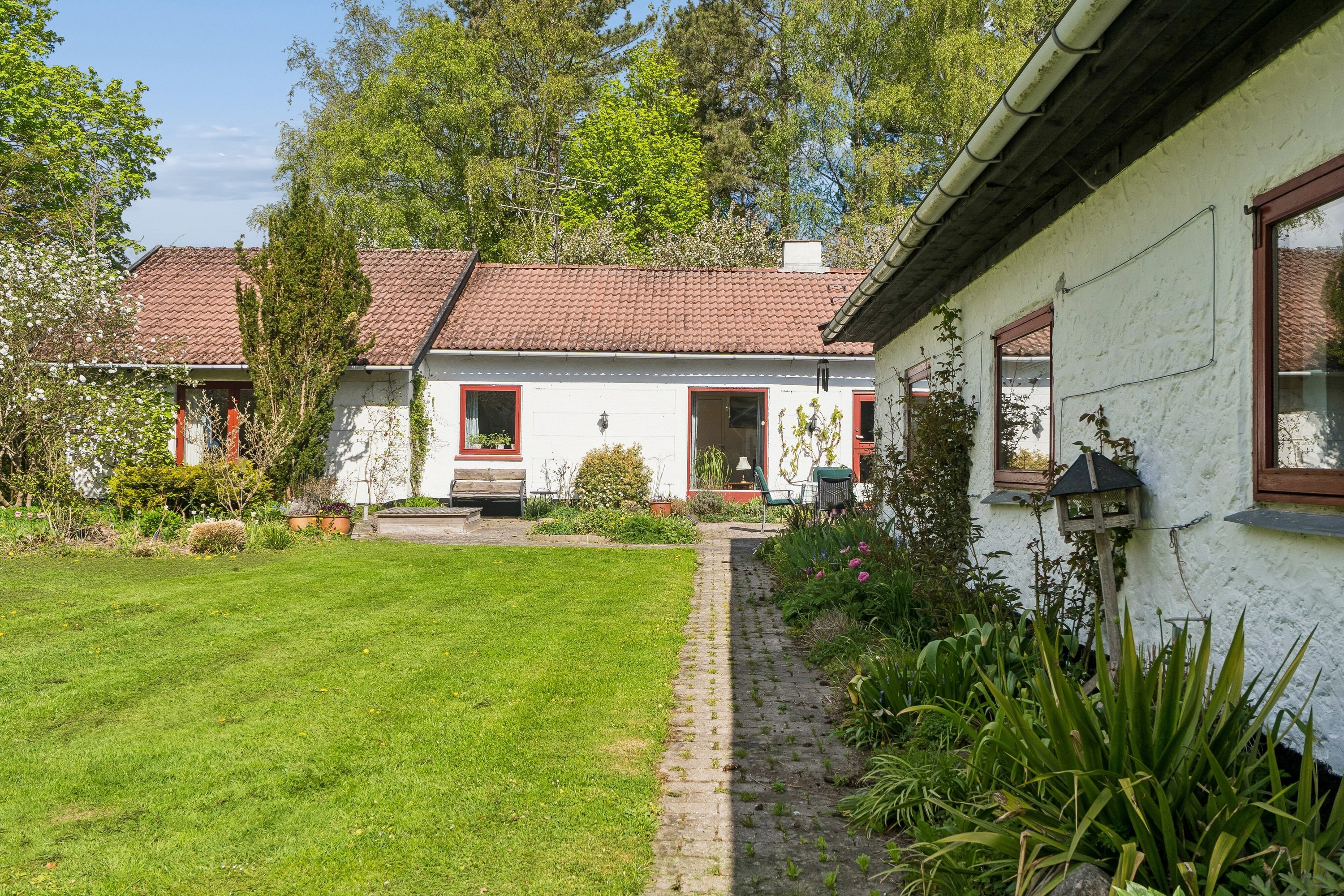 Fremhævet set fra haven billede i fuldskærmstilstand. Billede af Vejenbrødvej 34, 2980 Kokkedal