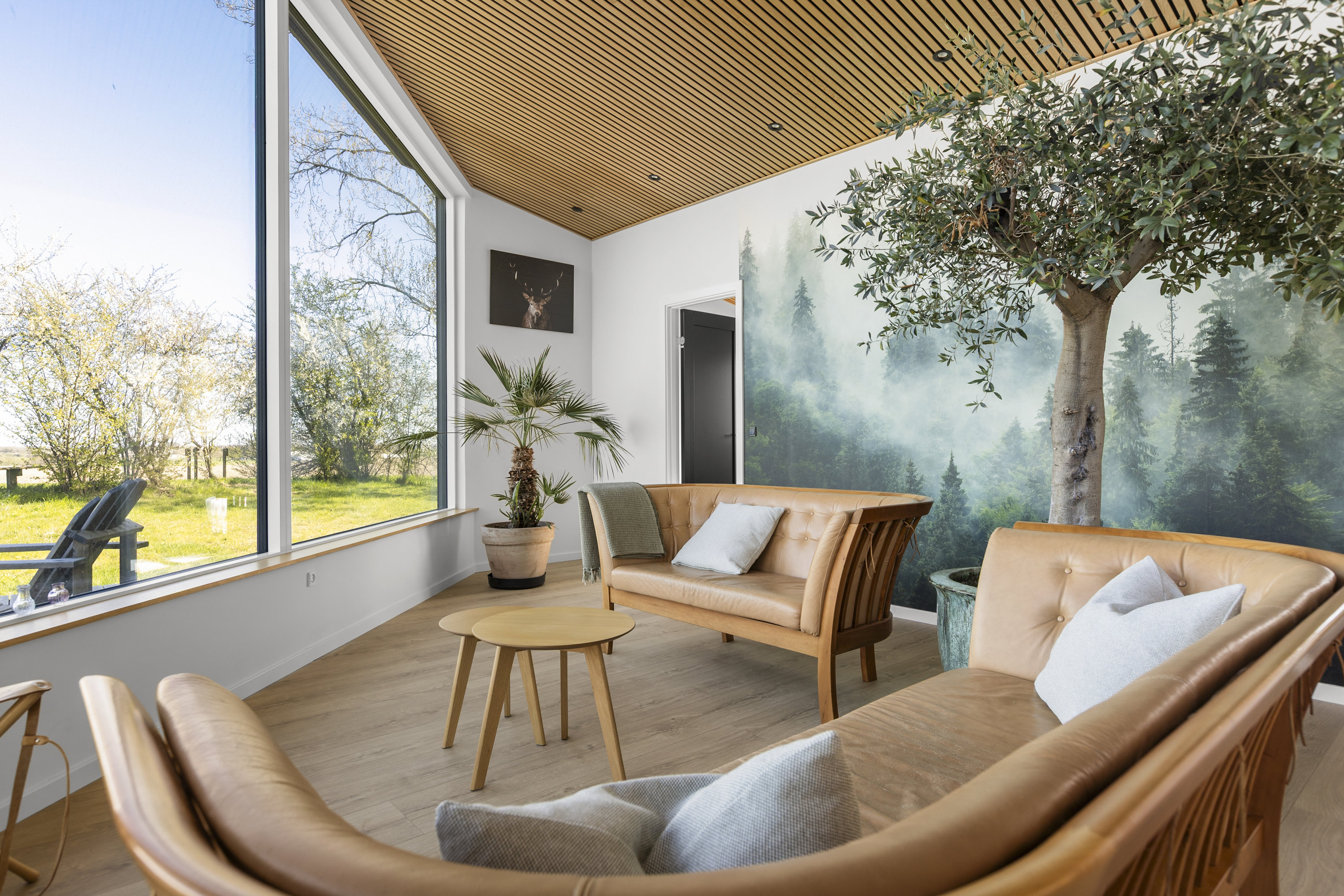 Fremhævet stue billede i fuldskærmstilstand. Billede af Ll Troldmosevej 4, Venslev, 4050 Skibby