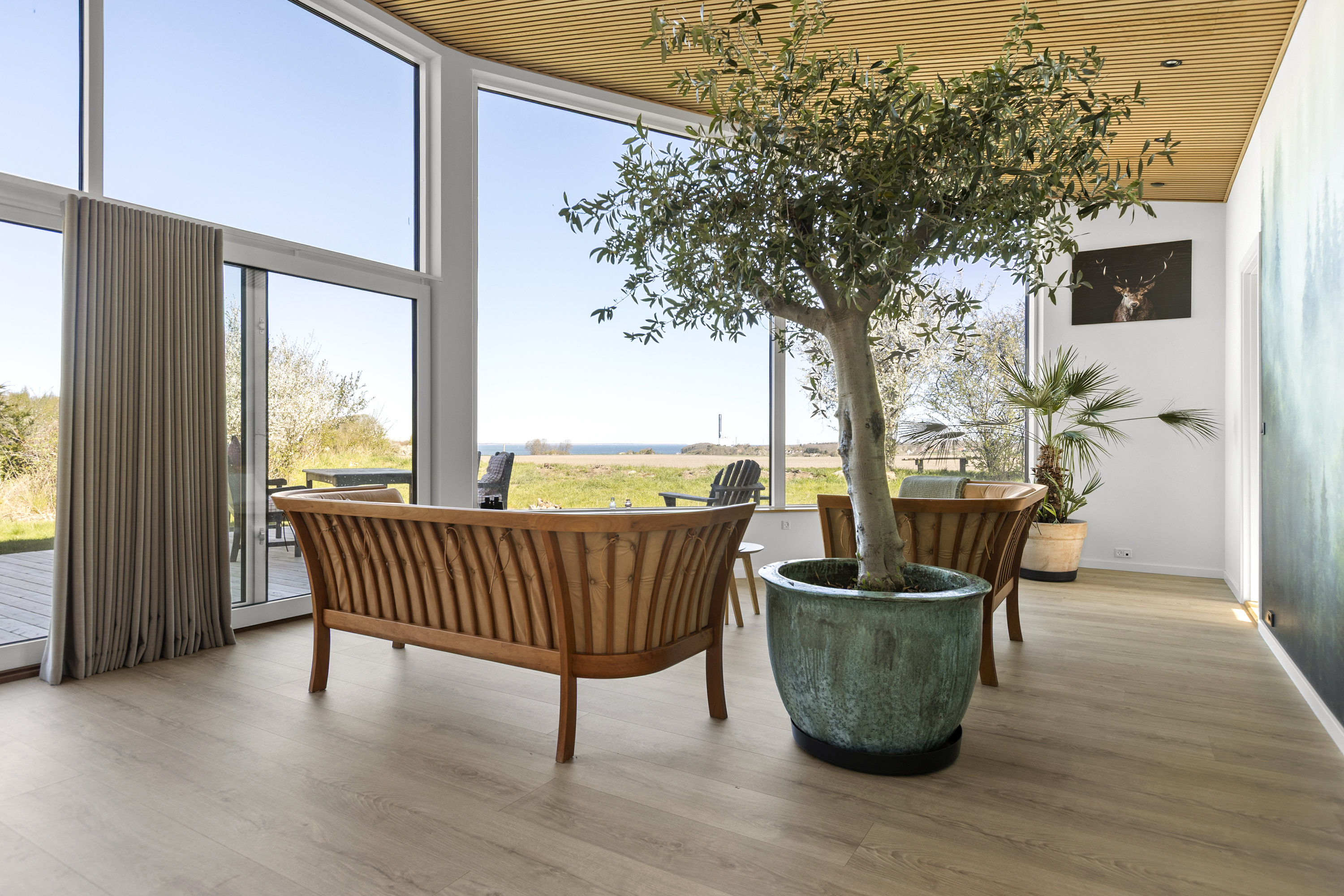 Fremhævet stue billede i fuldskærmstilstand. Billede af Ll Troldmosevej 4, Venslev, 4050 Skibby