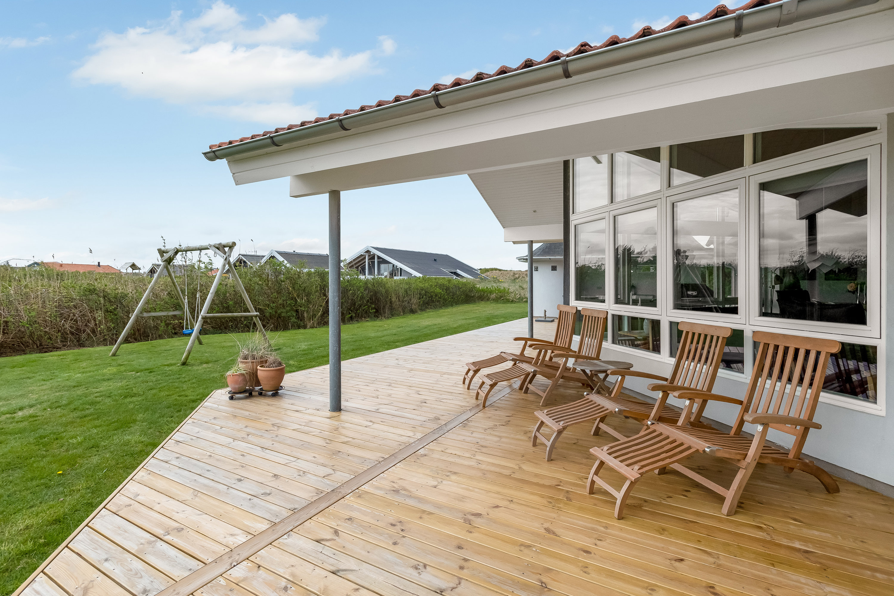 Fremhævet terrasse billede i fuldskærmstilstand. Billede af Laust Diges Vej 11, Haurvig, 6960 Hvide Sande