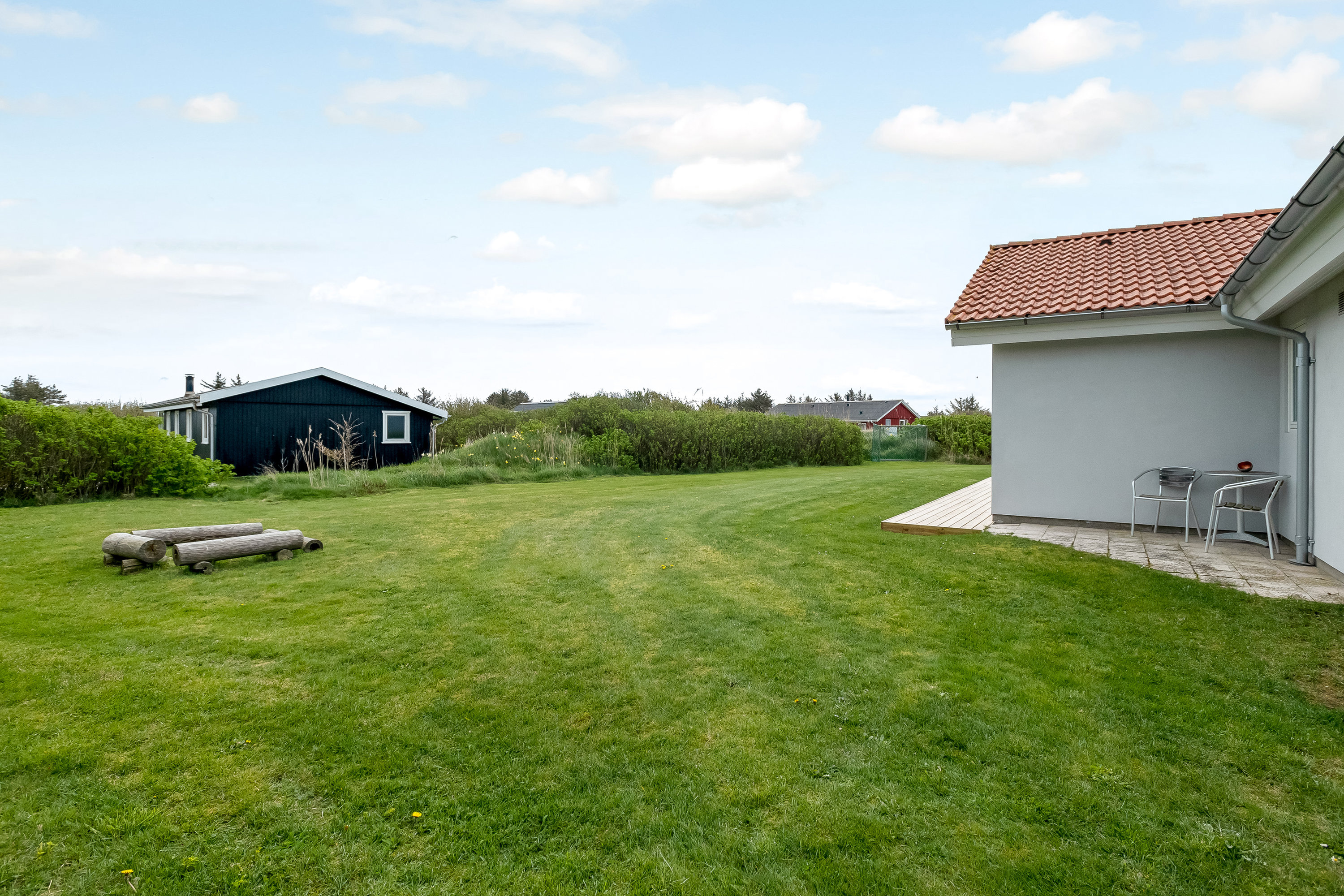 Fremhævet have billede i fuldskærmstilstand. Billede af Laust Diges Vej 11, Haurvig, 6960 Hvide Sande