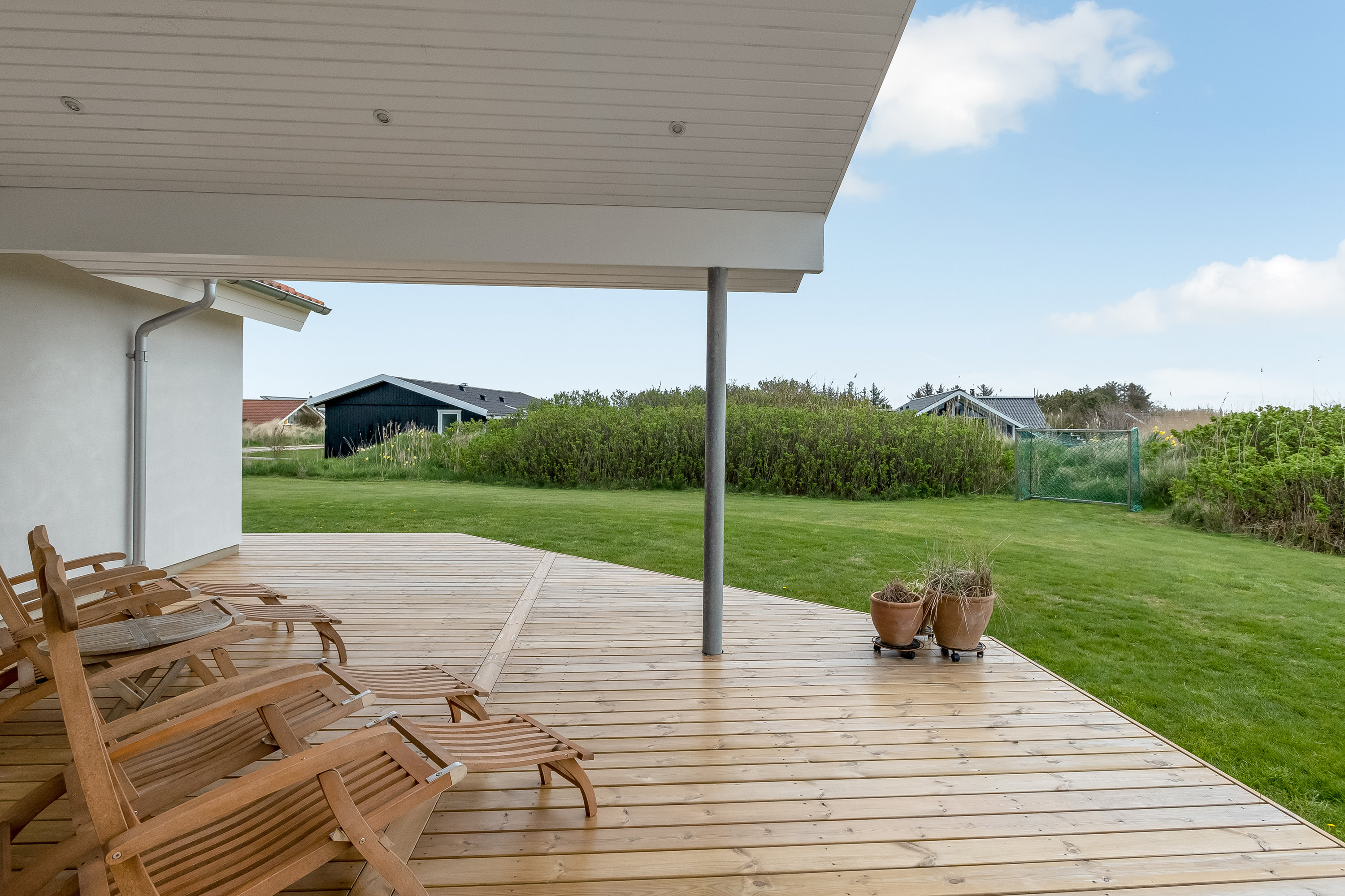 Fremhævet terrasse billede i fuldskærmstilstand. Billede af Laust Diges Vej 11, Haurvig, 6960 Hvide Sande