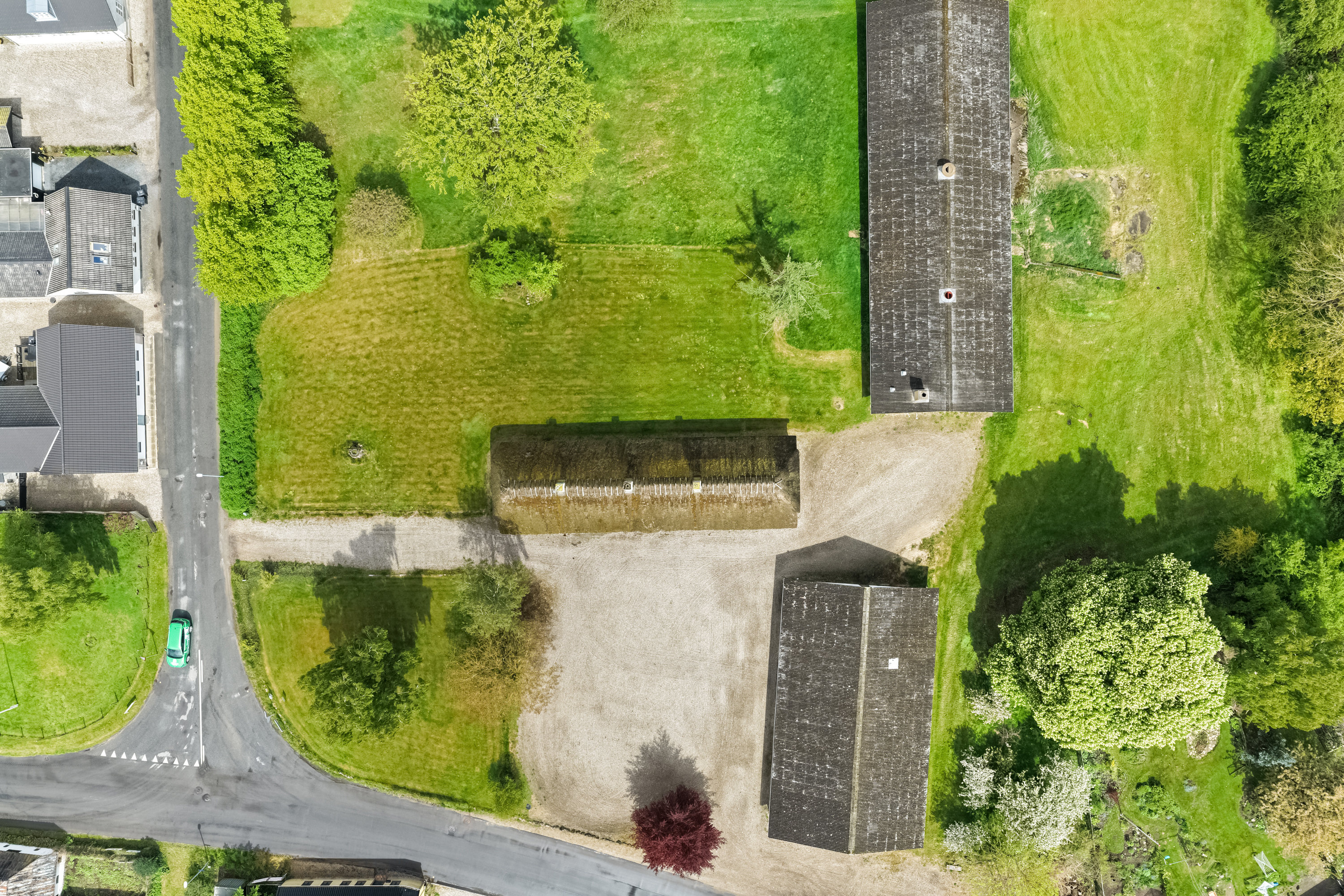 Fremhævet luftfoto billede i fuldskærmstilstand. Billede af Strandgade 117, Strandby, 5683 Haarby