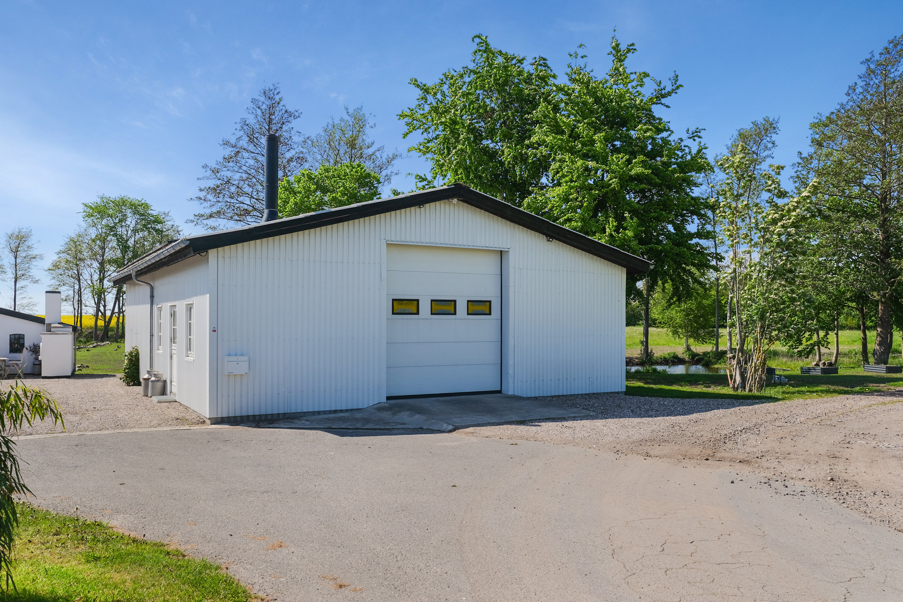 Fremhævet garage billede i fuldskærmstilstand. Billede af Lundemosevej 2, Ennebølle, 5953 Tranekær