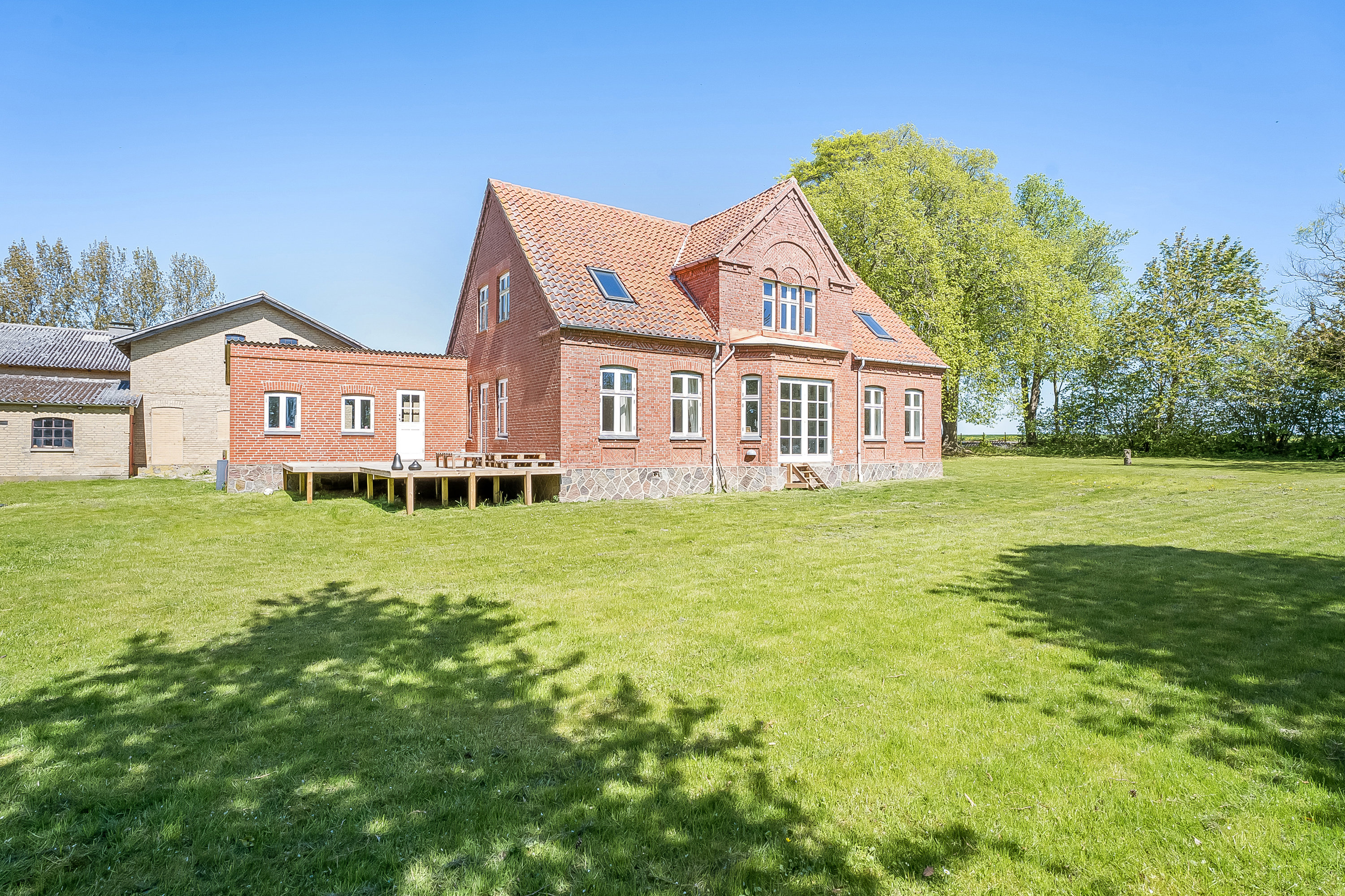 Fremhævet facade billede i fuldskærmstilstand. Billede af Sdr. Kirkebyvej 8, Nr Ørslev, 4800 Nykøbing F
