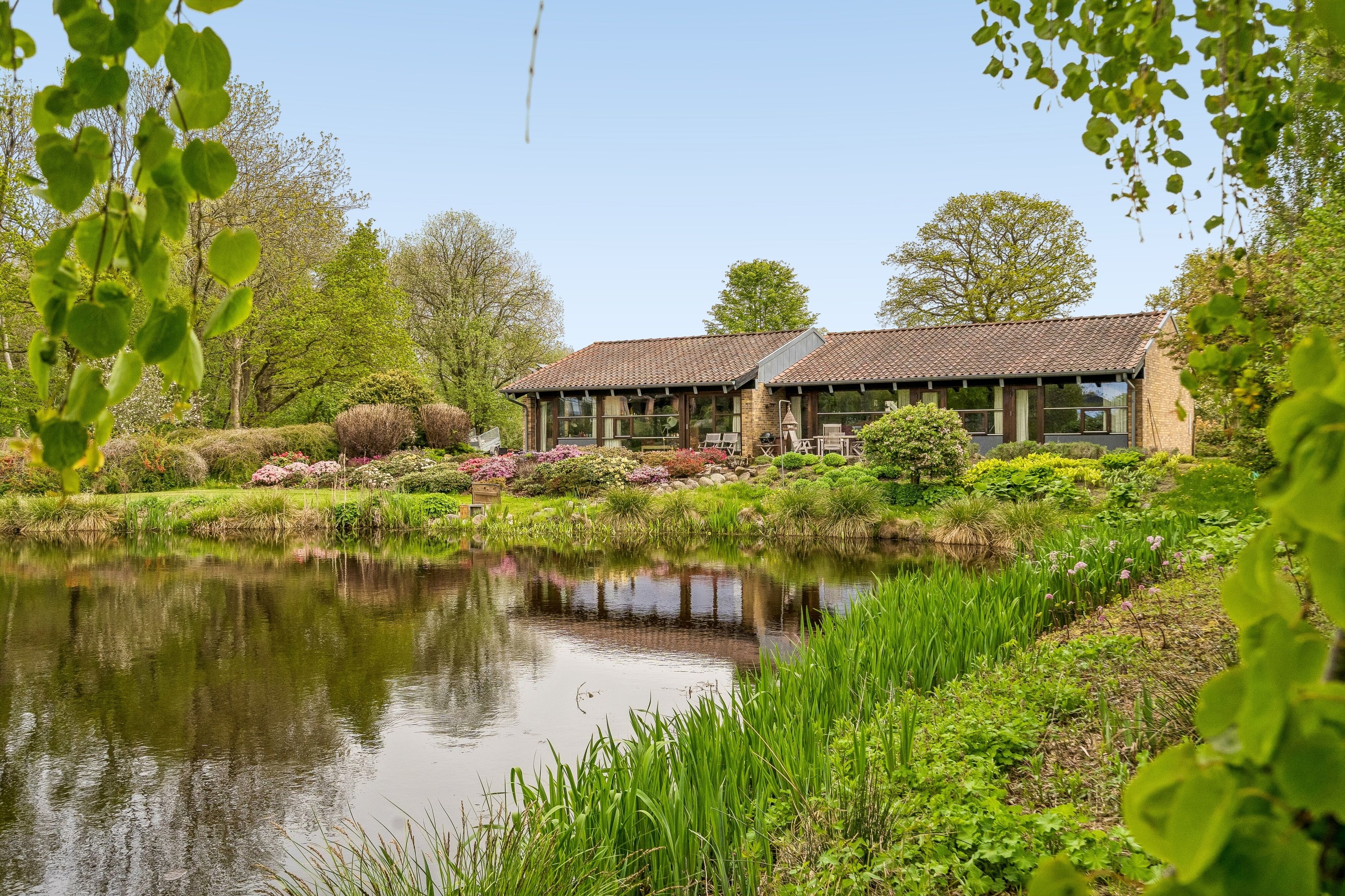Villa: Set fra haven på Syrenhaven 20, 6040 Egtved