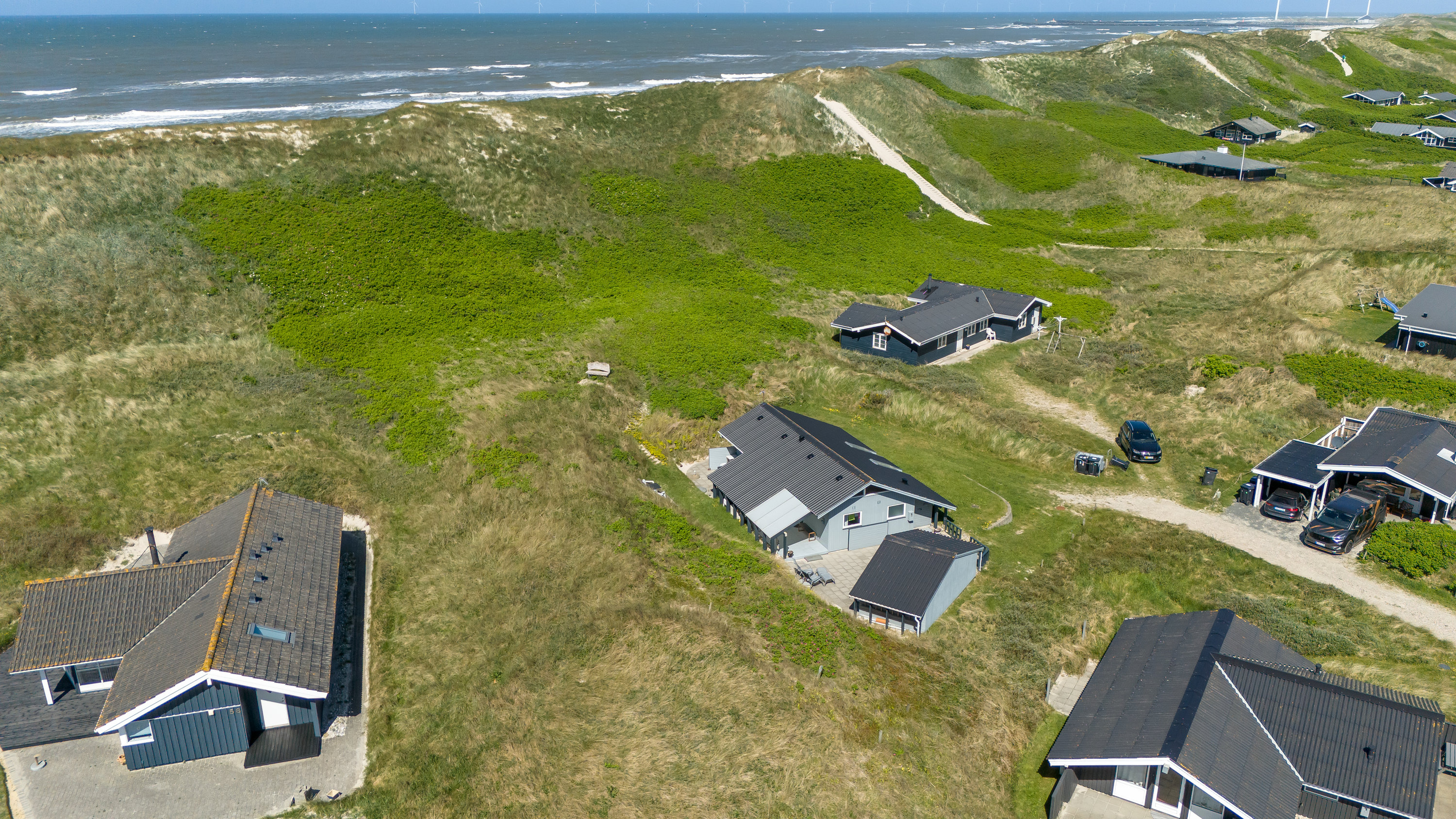 Fremhævet luftfoto billede i fuldskærmstilstand. Billede af Strandkrogvejen 54, Aargab, 6960 Hvide Sande