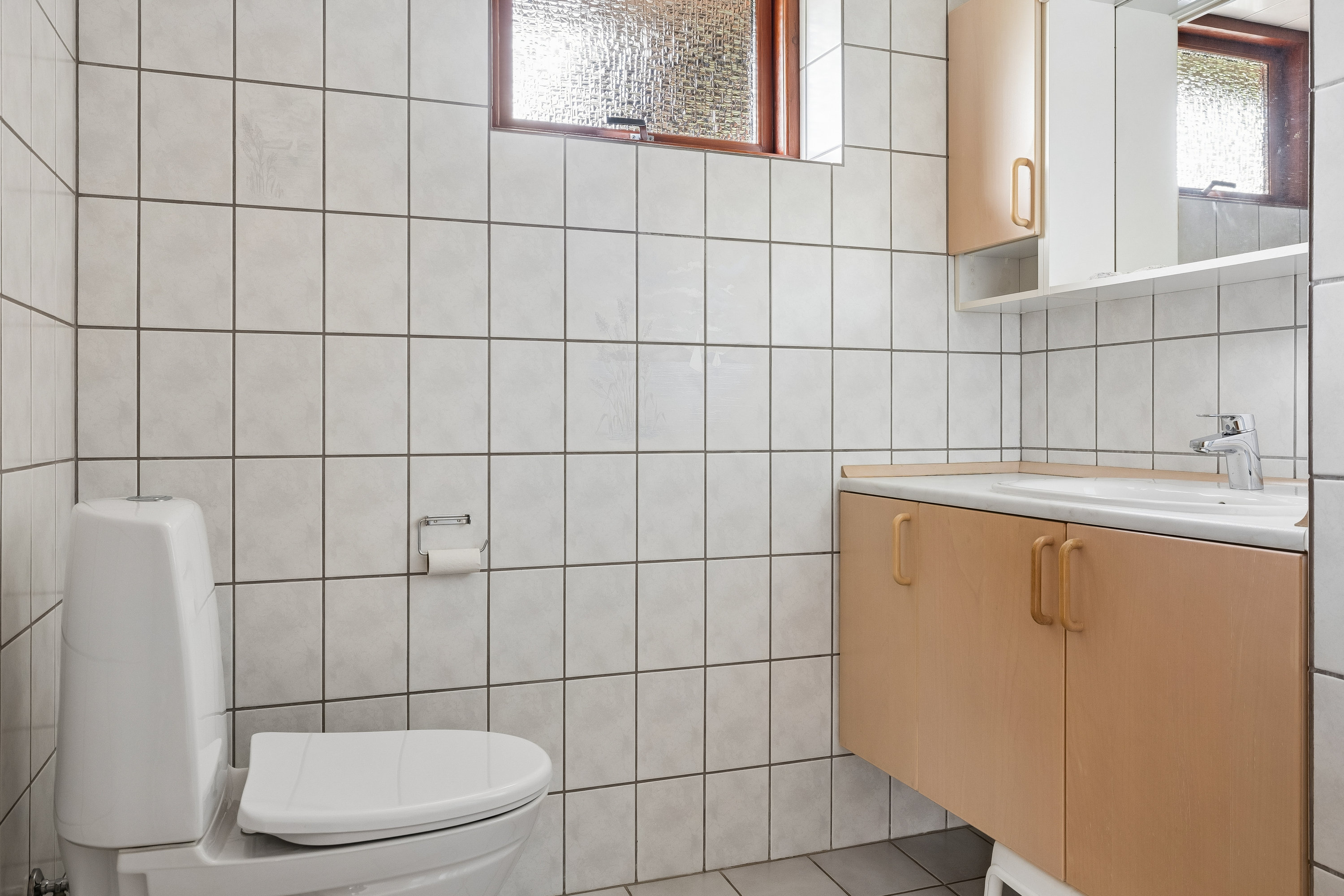 Fremhævet badeværelse billede i fuldskærmstilstand. Billede af Hjertegræsvej 20, Slukefter, 5210 Odense NV