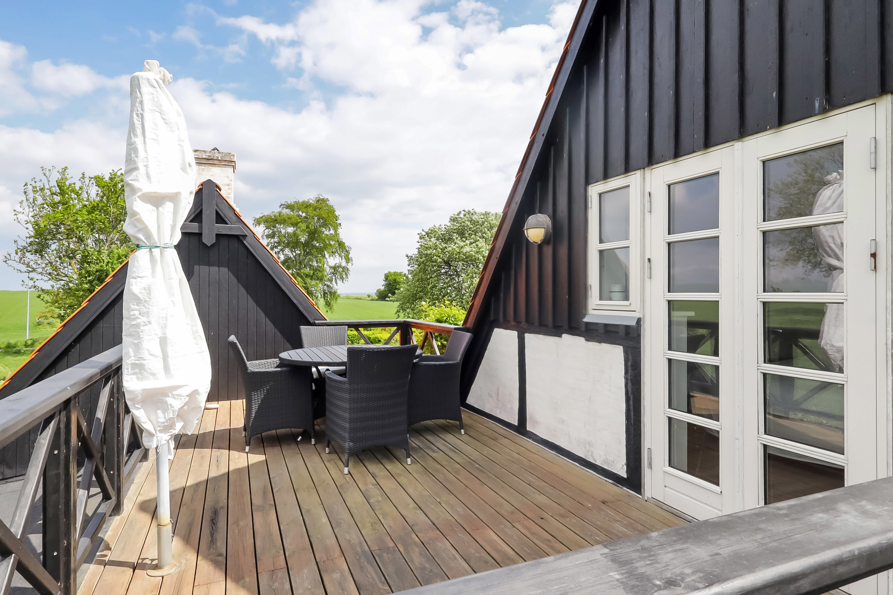 Fremhævet terrasse  billede i fuldskærmstilstand. Billede af Nederste Skovbymark 8, 5985 Søby Ærø