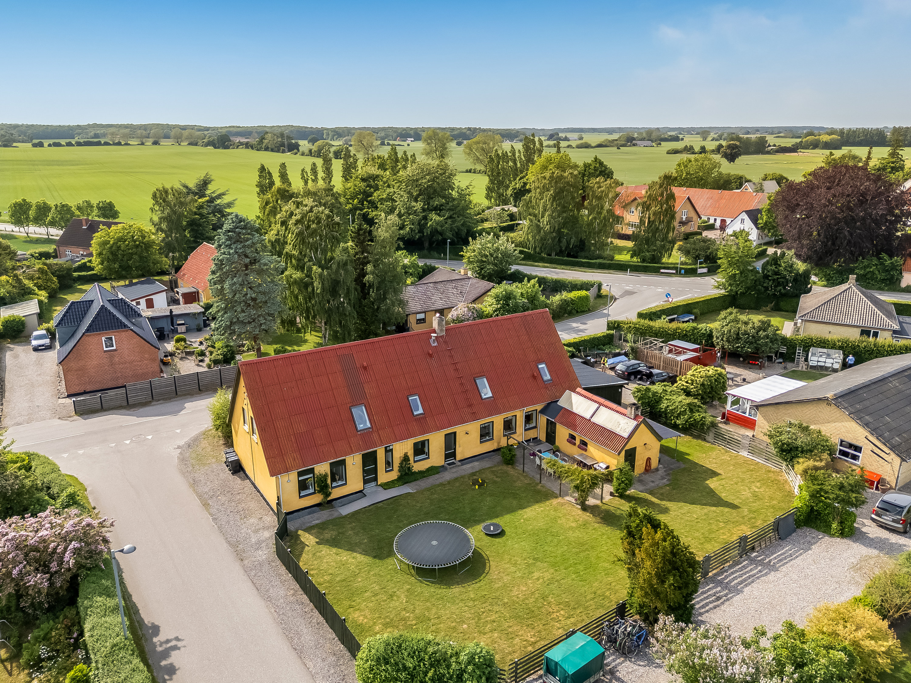 Fremhævet luftfoto billede i fuldskærmstilstand. Billede af Systofte Bygade 20, Systofte, 4800 Nykøbing F