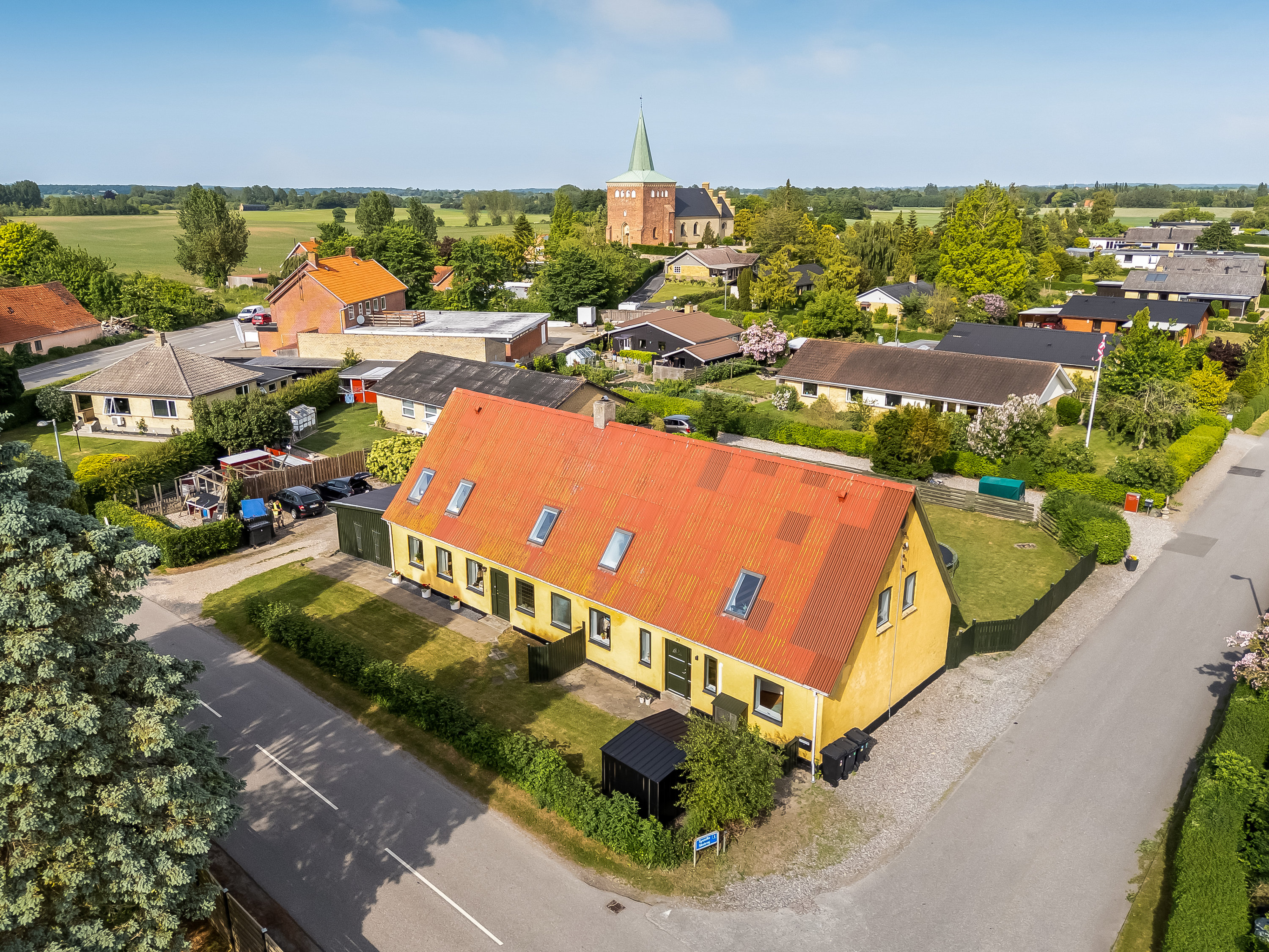 Fremhævet luftfoto billede i fuldskærmstilstand. Billede af Systofte Bygade 20, Systofte, 4800 Nykøbing F