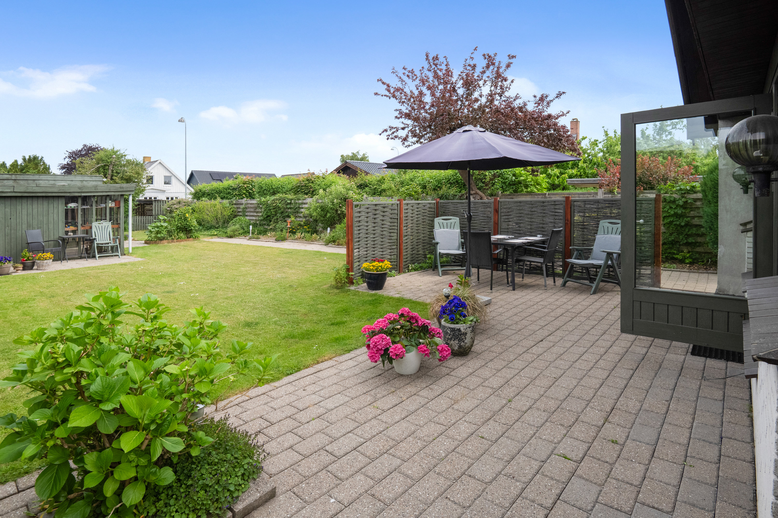 Fremhævet overdækket terrasse billede i fuldskærmstilstand. Billede af Brostykkevej 31B, 2650 Hvidovre