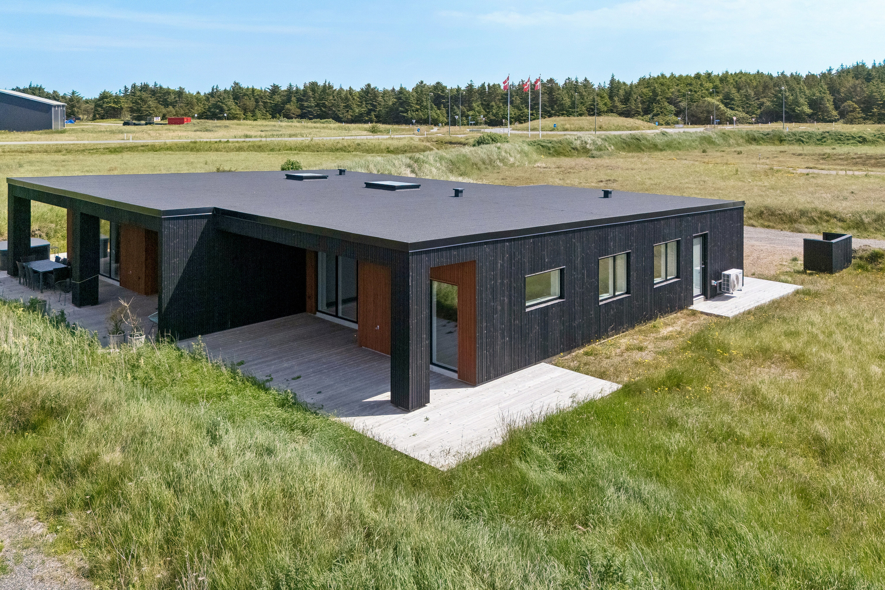 Fremhævet set fra haven billede i fuldskærmstilstand. Billede af Sortebærbakken 9, Vorupør, 7700 Thisted