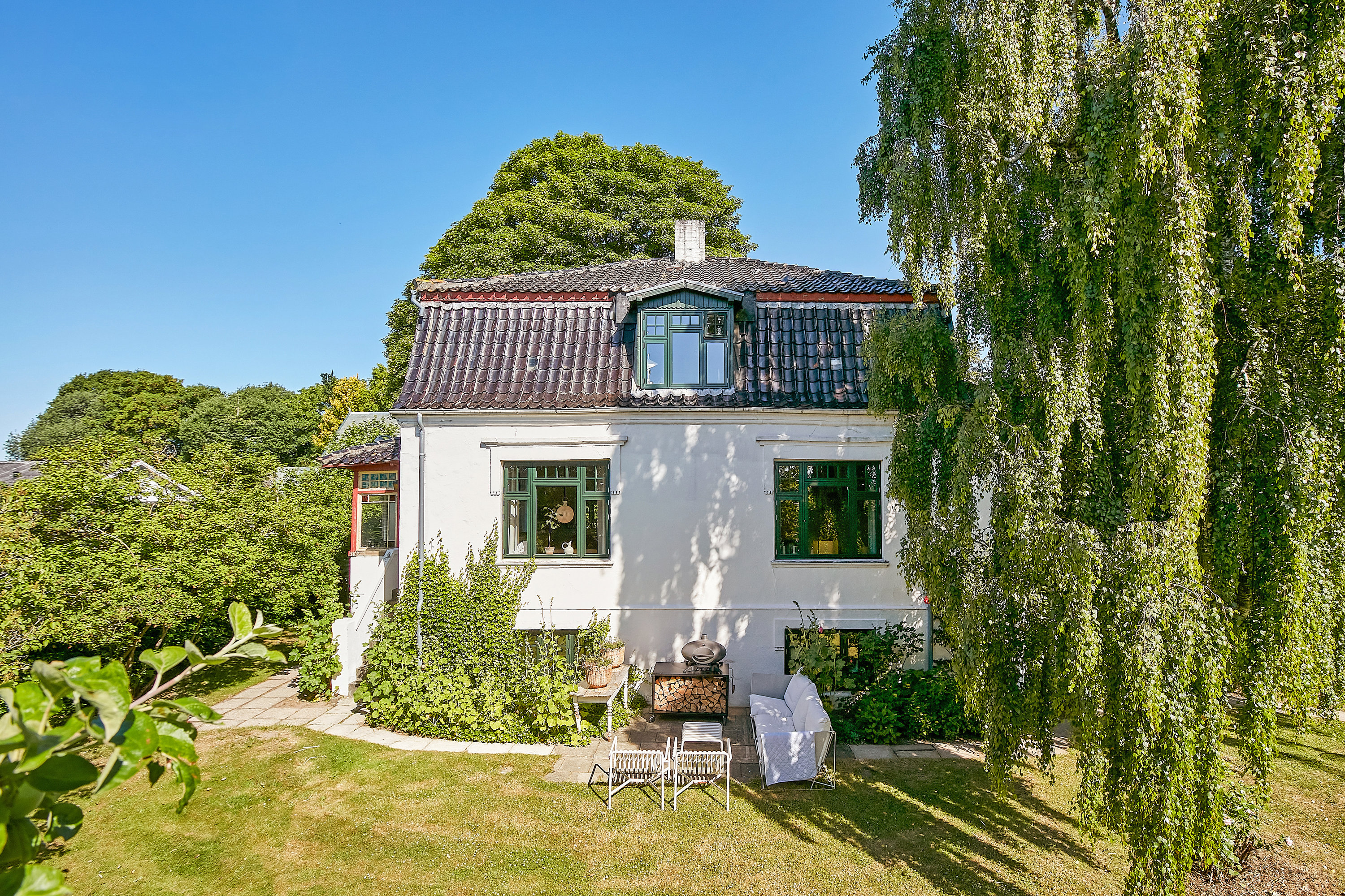 Fremhævet facade fra haven billede i fuldskærmstilstand. Billede af Haldrupvej 36, Søvind, 8700 Horsens