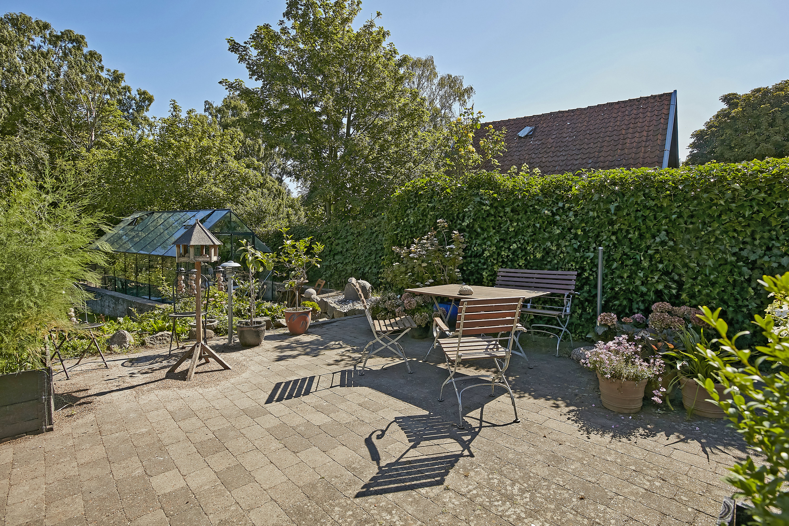 Fremhævet terrasse billede i fuldskærmstilstand. Billede af Bisholt Strandvej 6, Bisholt, 7130 Juelsminde