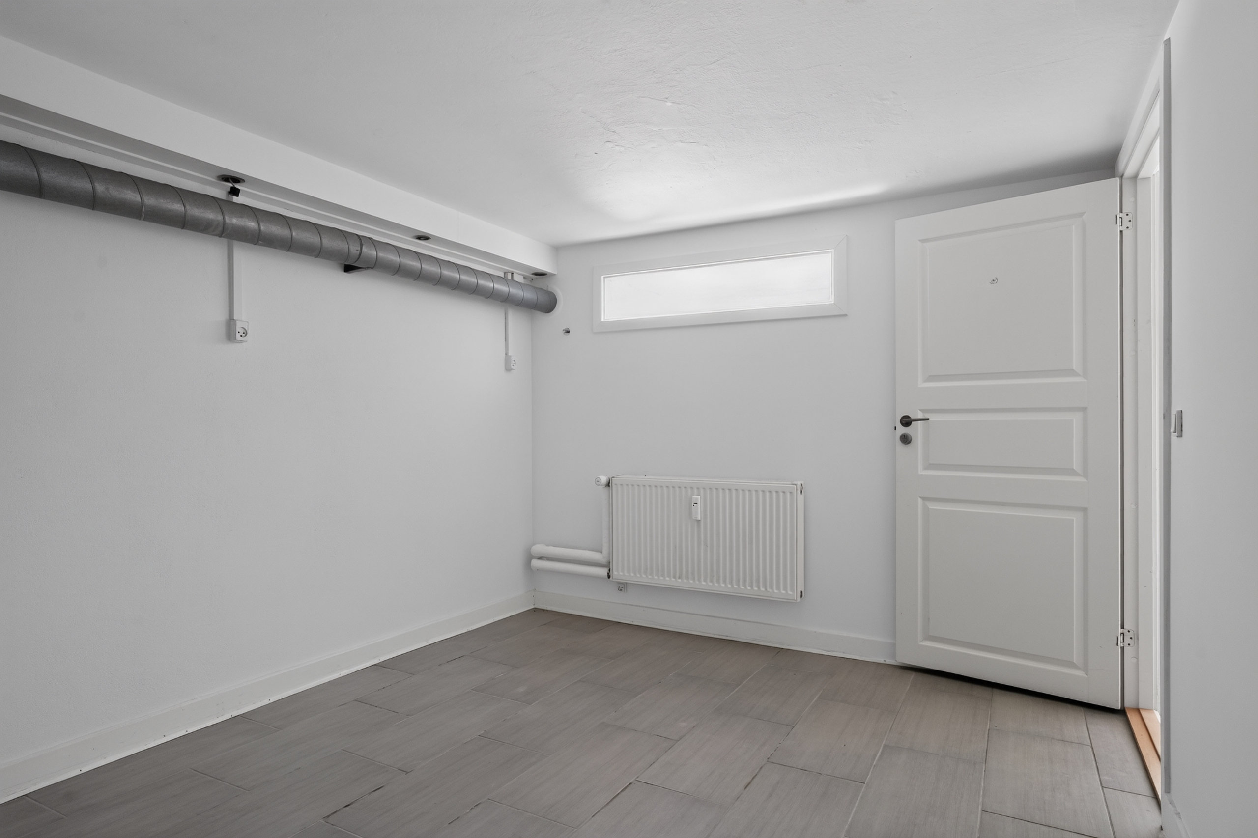 Fremhævet kælder billede i fuldskærmstilstand. Billede af Buddingevej 69A, 2800 Kongens Lyngby