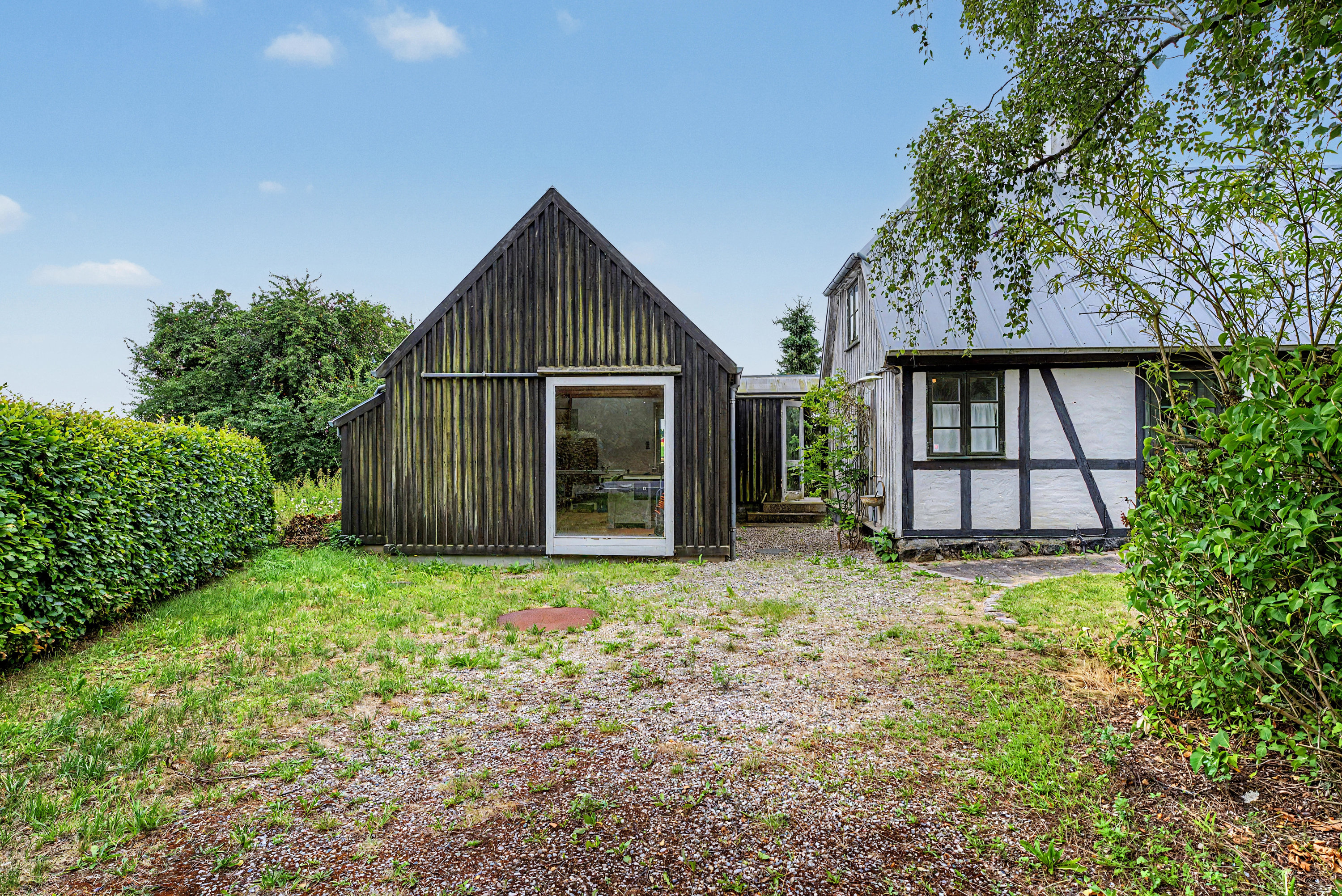 Fremhævet facade billede i fuldskærmstilstand. Billede af Bandholmvej 144, Birket, 4943 Torrig L