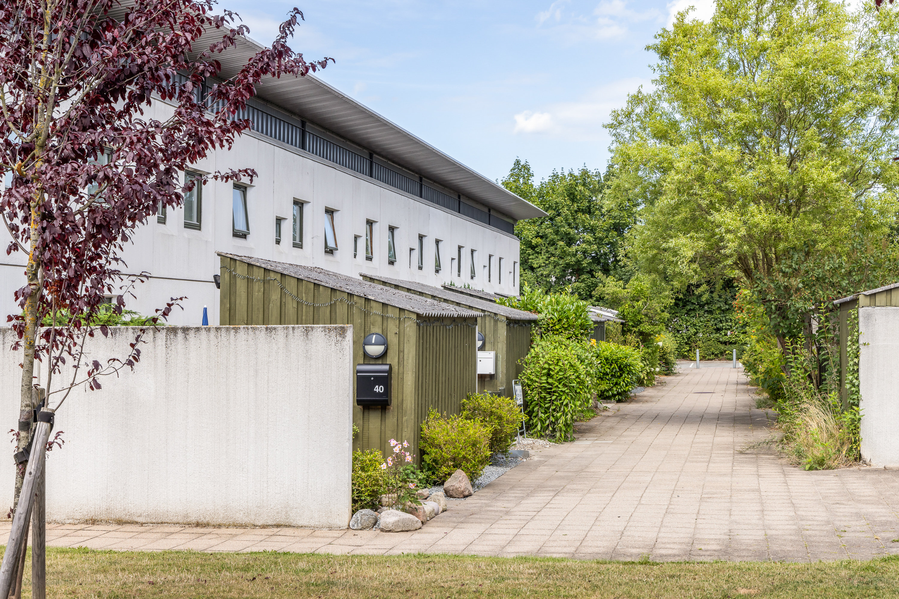 Fremhævet facade billede i fuldskærmstilstand. Billede af Rævehøjparken 38, 2800 Kongens Lyngby