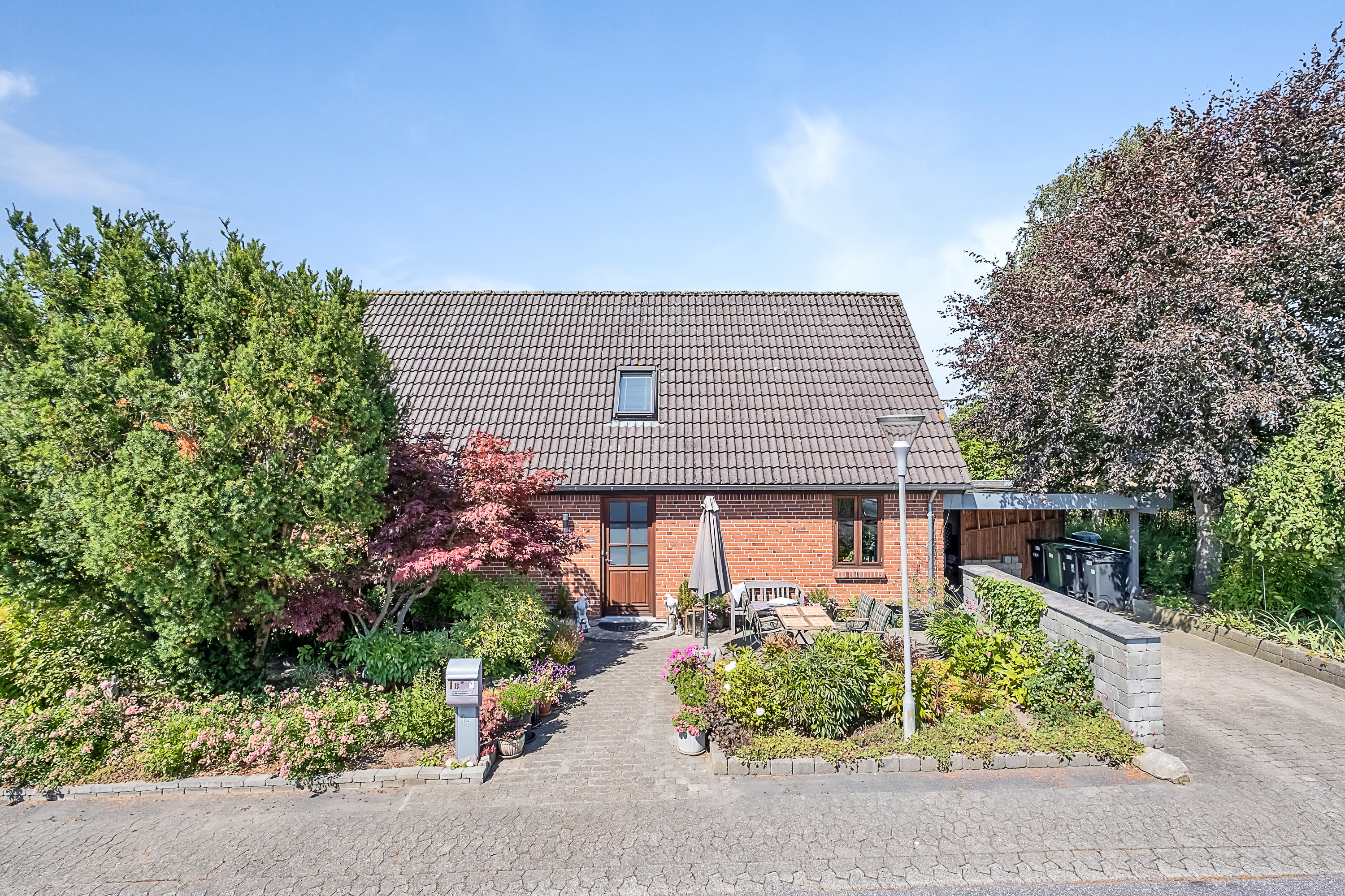 Villa: Facade på Ørnelunden 1B, 8520 Lystrup