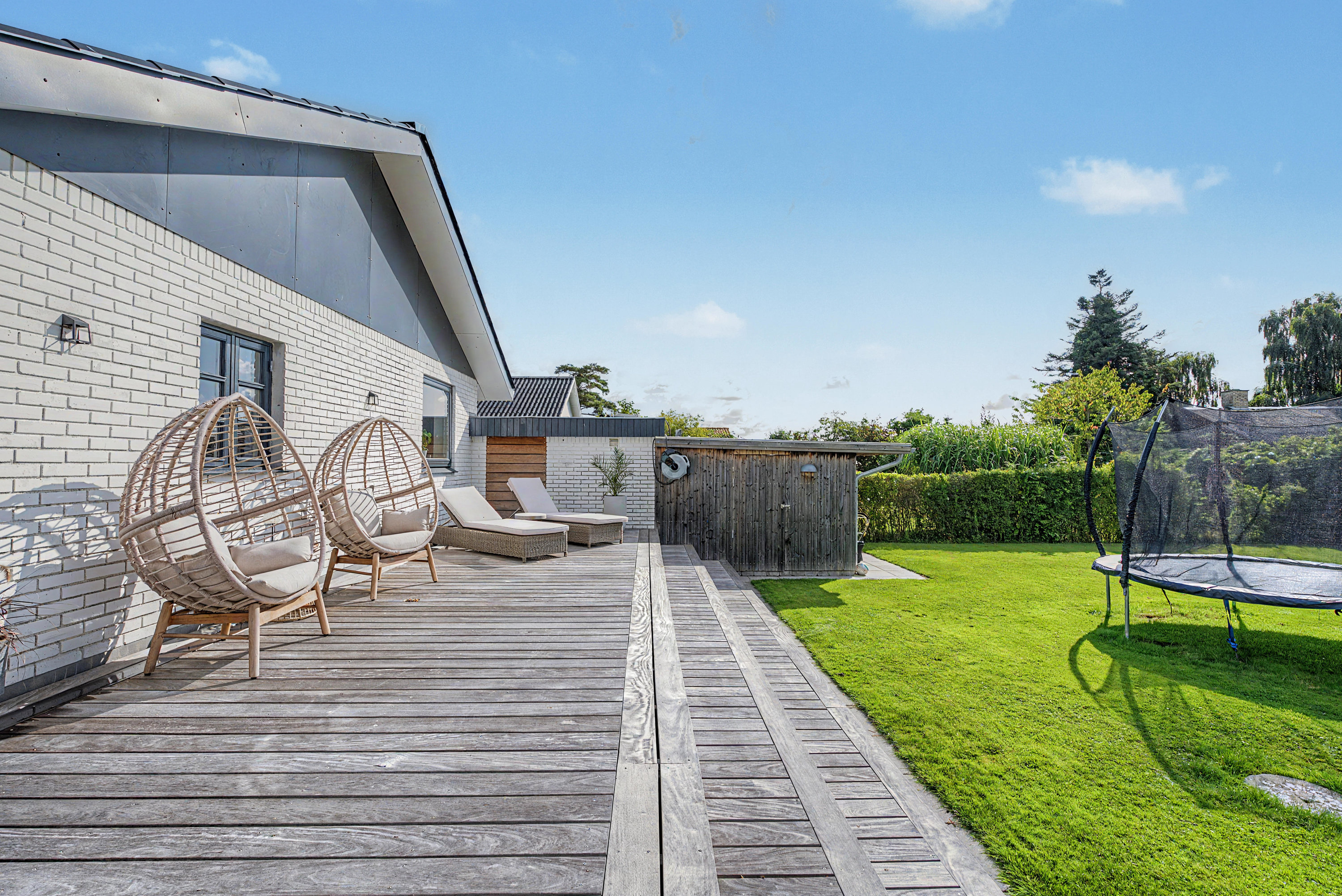 Fremhævet terrasse billede i fuldskærmstilstand. Billede af Sundvænget 3A, Hasselø Pl, 4800 Nykøbing F