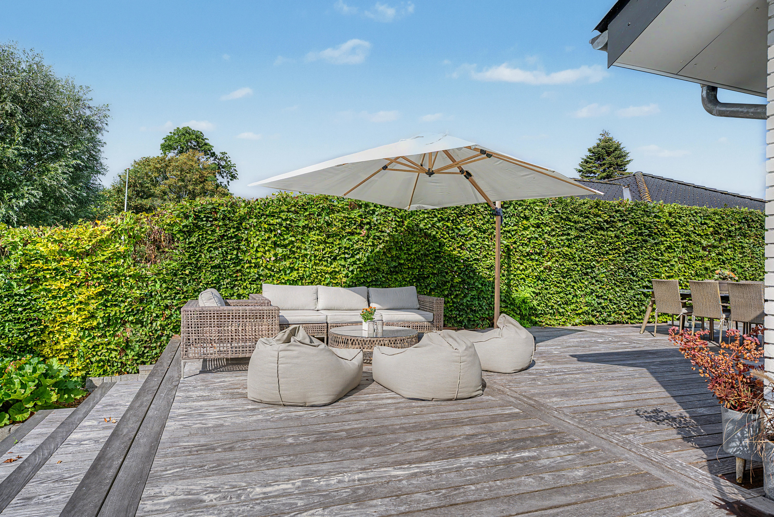 Fremhævet terrasse billede i fuldskærmstilstand. Billede af Sundvænget 3A, Hasselø Pl, 4800 Nykøbing F