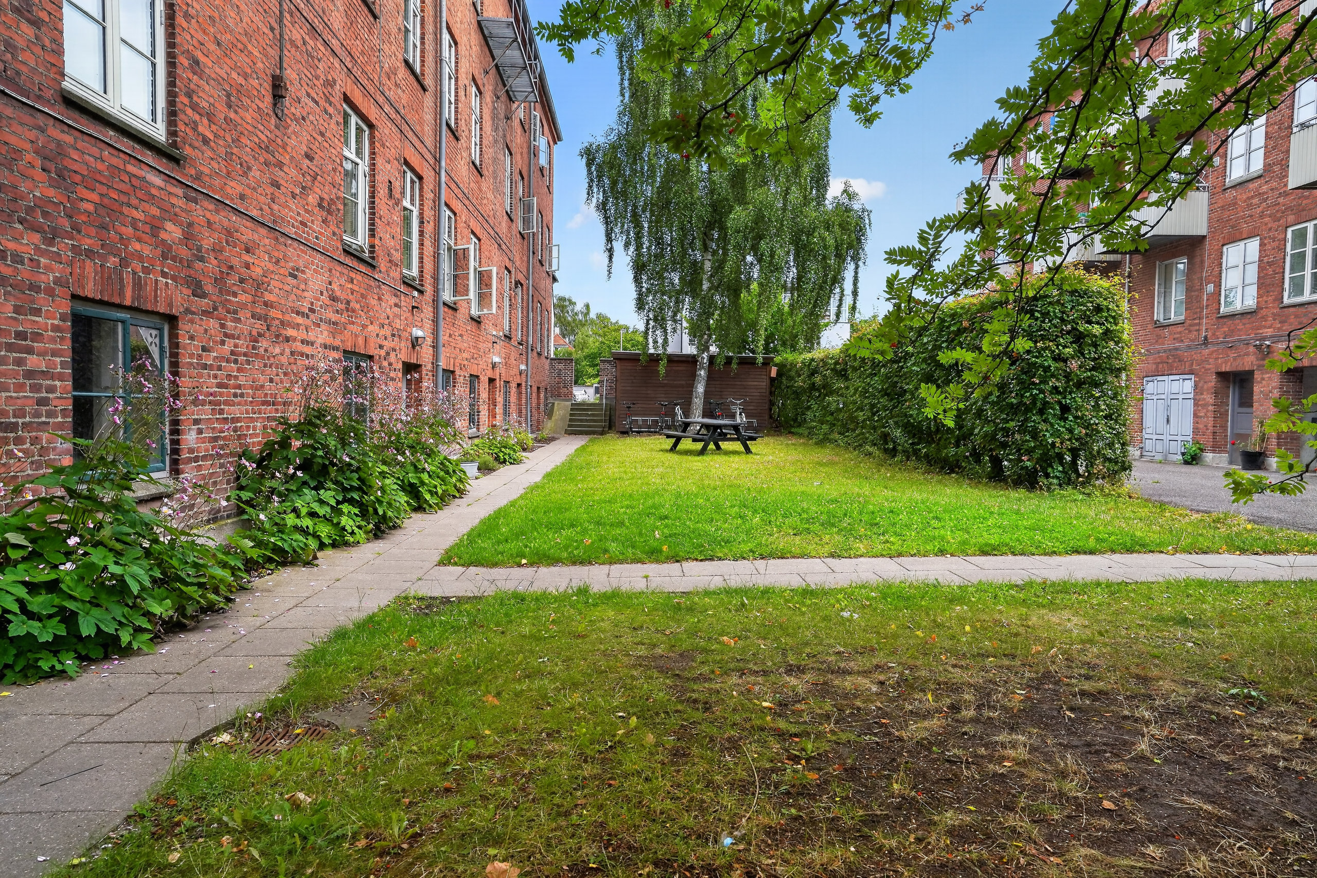 Fremhævet gårdmiljø billede i fuldskærmstilstand. Billede af Roskildevej 151, st. th., 2500 Valby