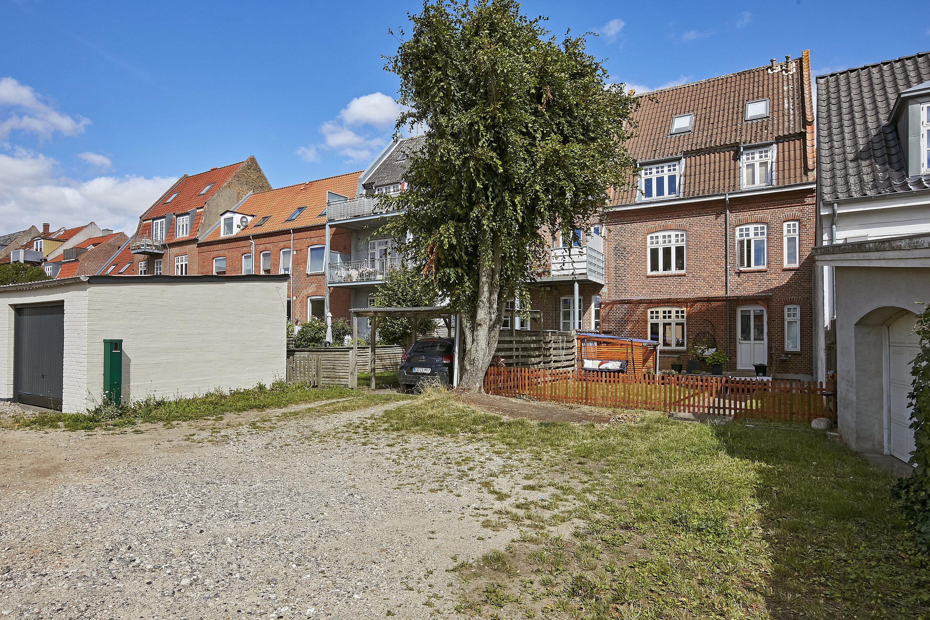 Fremhævet facade fra haven billede i fuldskærmstilstand. Billede af Fredericiagade 44, st., Østbyen, 8700 Horsens