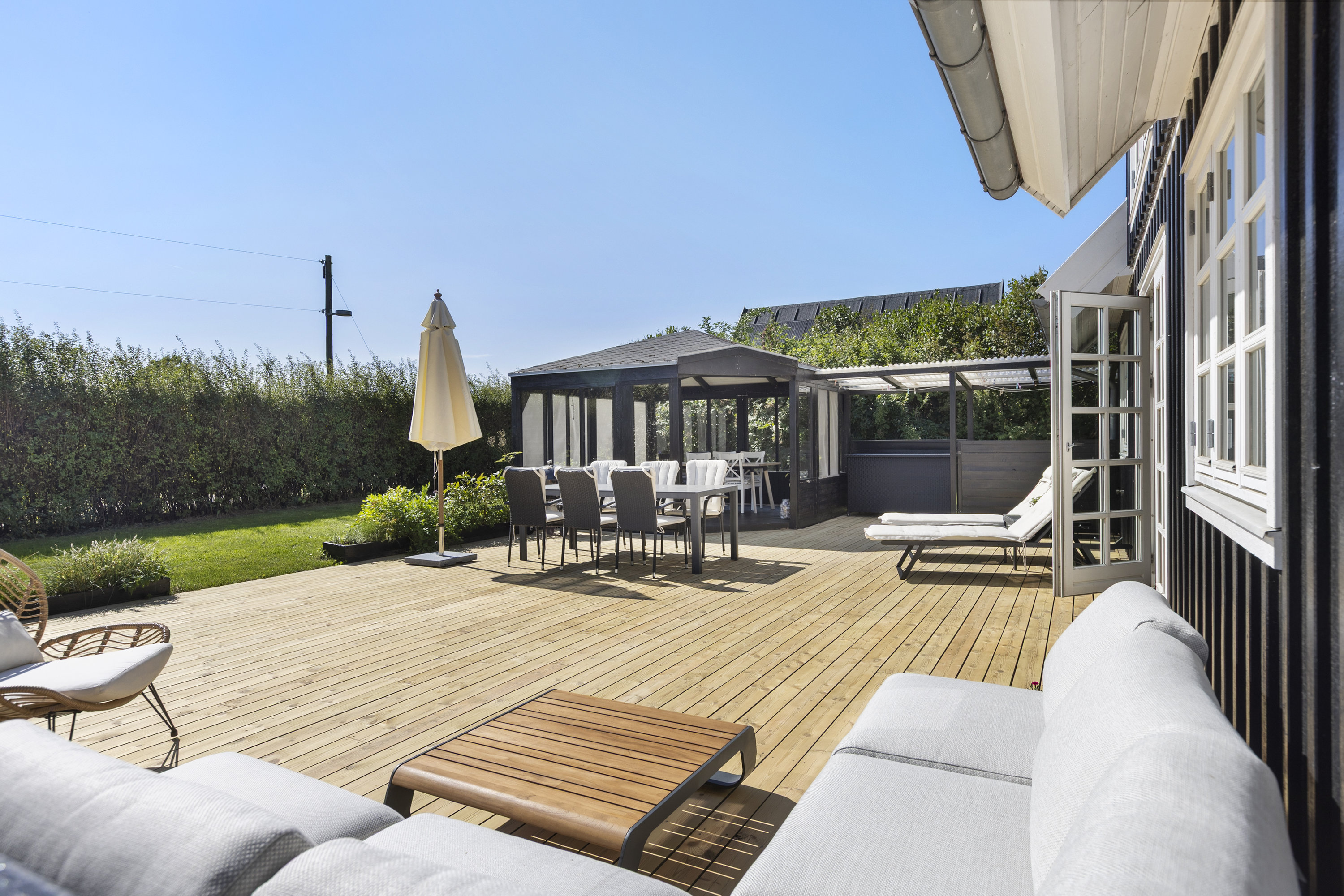 Fremhævet terrasse billede i fuldskærmstilstand. Billede af Vigvejen 8, Vellerup, 4050 Skibby