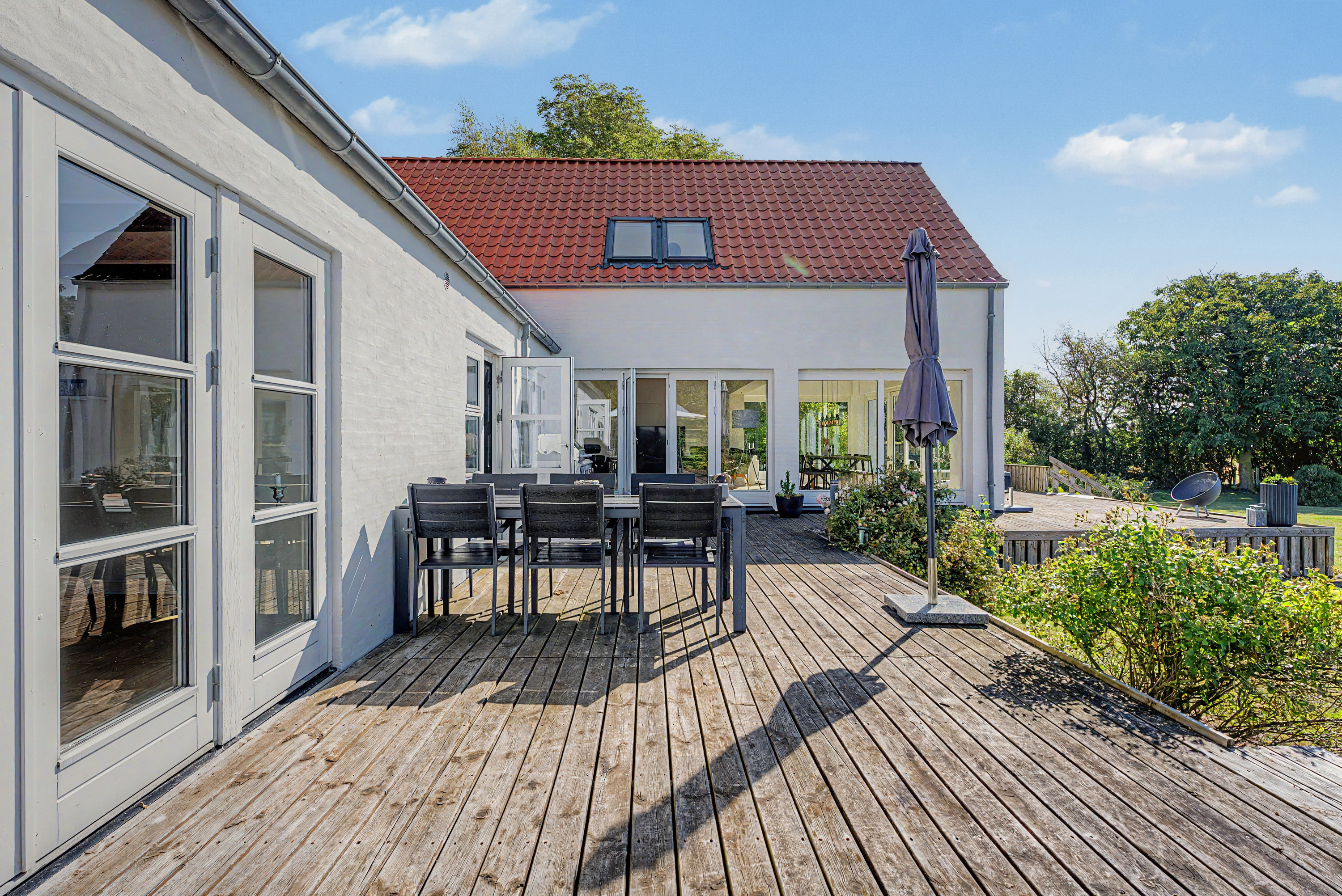Fremhævet terrasse billede i fuldskærmstilstand. Billede af Middelgrundsvej 4, 4912 Harpelunde
