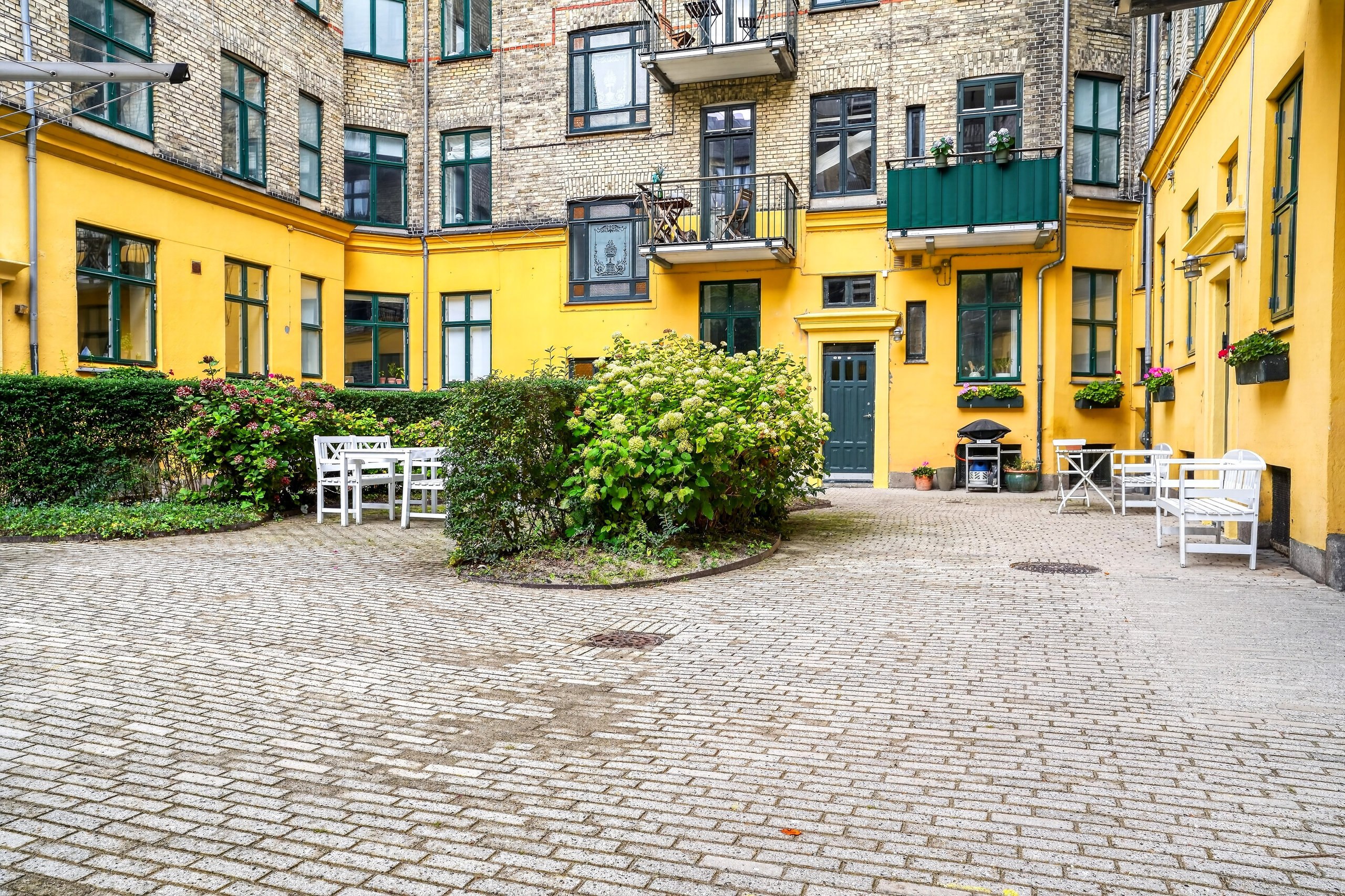 Fremhævet gårdmiljø billede i fuldskærmstilstand. Billede af Faksegade 7, 2. tv., 2100 København Ø